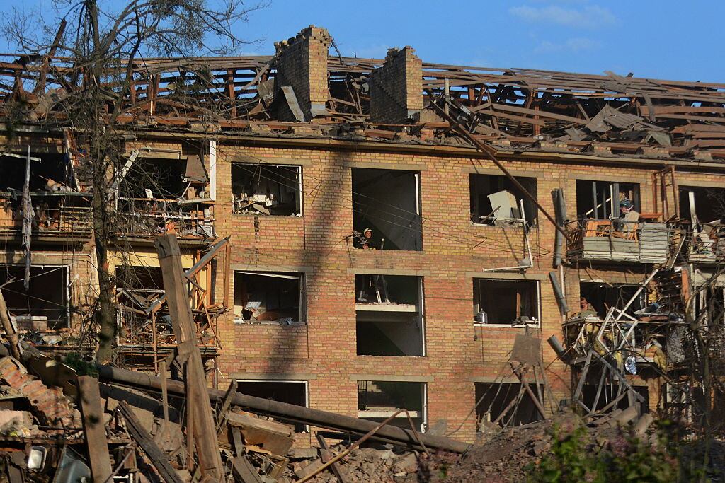 KYIV, UKRAINE - APRIL 24: A 5-story residential building in Svyatoshynskyi district is heavily damaged by a Russian missile strike on April 24, 2025 in Kyiv, Ukraine. In the early morning, Russia has launched a mass combined attack on the Ukrainian capital, and other cities of Ukraine. The strike on Kyiv resulted in the destruction of multi-story residential buildings, damage to administrative buildings, and non-residential buildings. At least ten people were killed and 63 were injured, including six children. Rescue workers continue to search for people under the rubble. (Photo by Oleksandr Gusev/Global Images Ukraine via Getty Images)