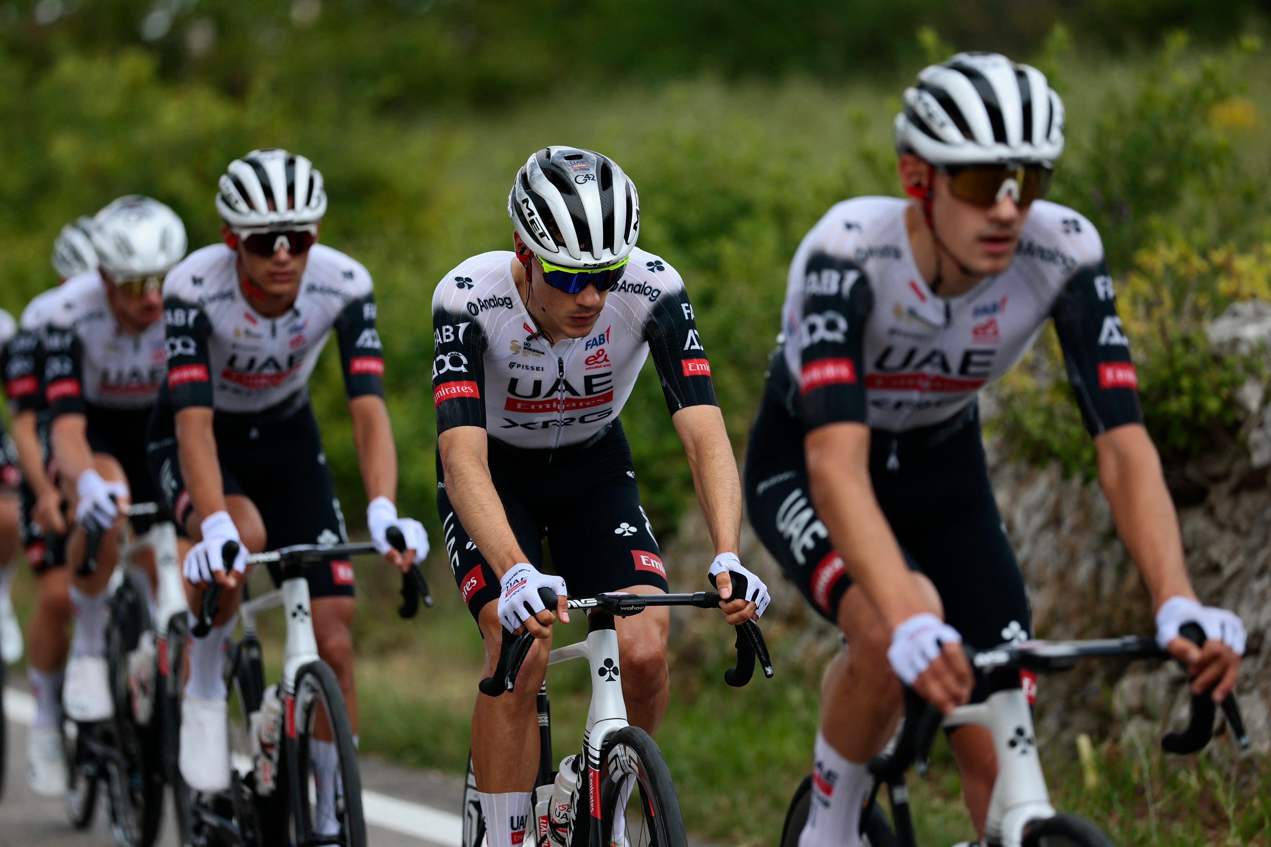 UAE Team Emirates XRG's Spanish rider Juan Ayuso (C) and his teammates compete in the 5th stage of the 108th Giro d'Italia cycling race 151kms from Ceglie Messapica to Matera on May 14, 2025. (Photo by Luca Bettini / AFP)