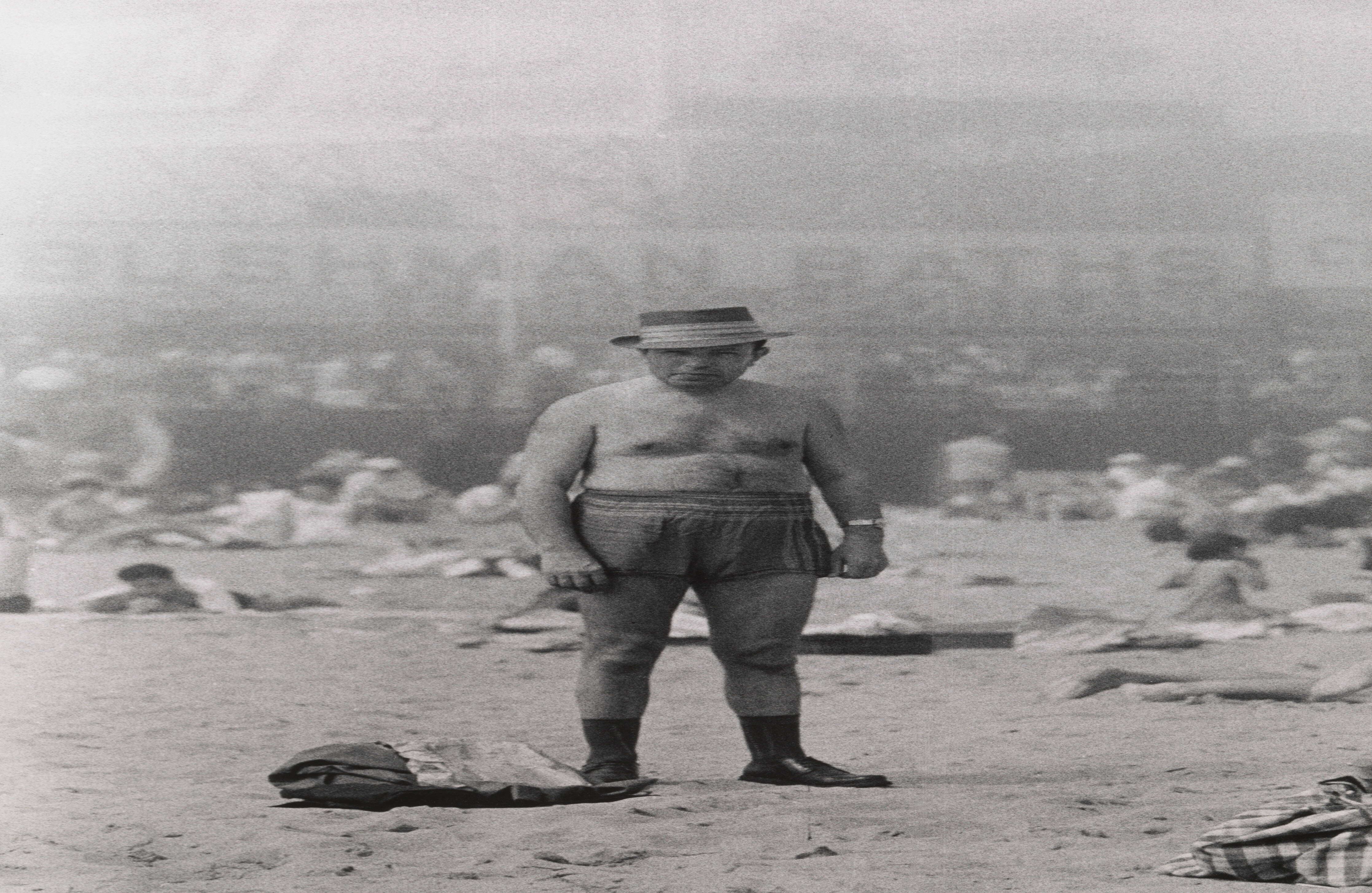 Man in hat, trunks, socks and shoes, Coney Island, N.Y. 1960. © The Estate of Diane Arbus, LLC. All Rights Reserved.