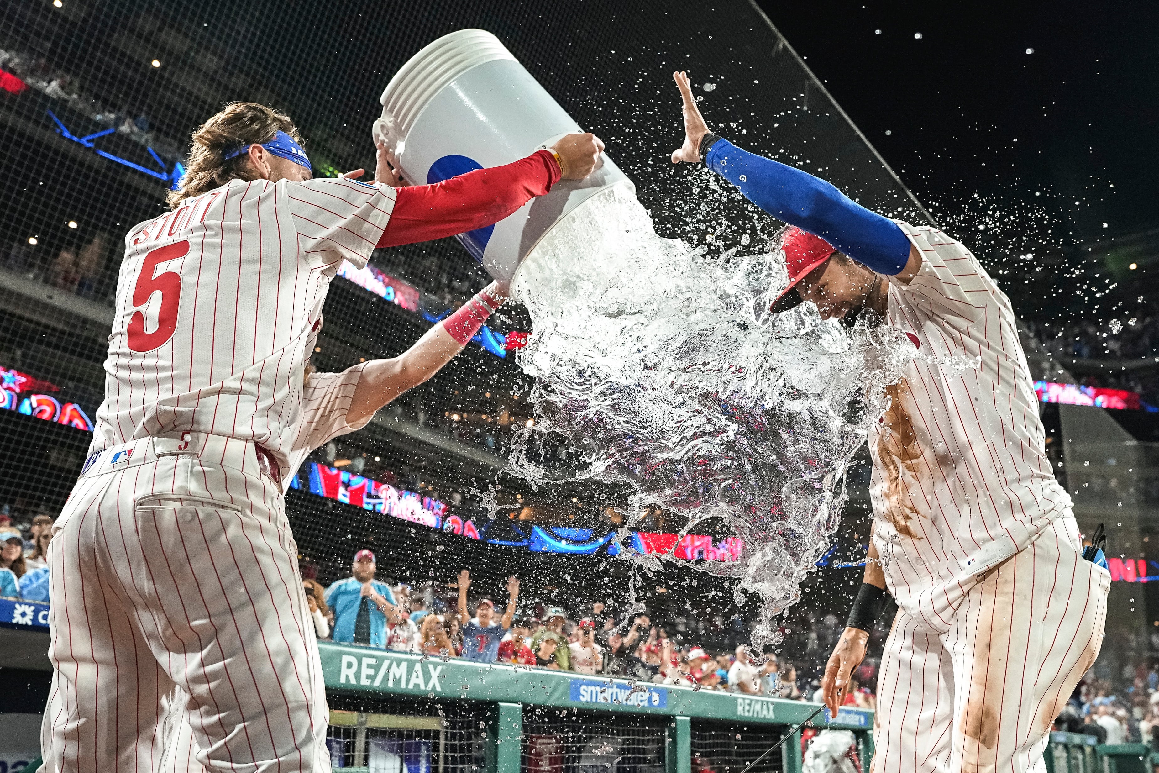 PHILADELPHIA, PA - AUGUST 30: Trea Turner #7 of the Philadelphia Phillies is showered in a Gatorade bath to celebrate a win after the game between the Atlanta Braves and the Philadelphia Phillies at Citizens Bank Park on Saturday, August 30, 2025 in Philadelphia, Pennsylvania. (Photo by Denis Kennedy/MLB Photos via Getty Images)