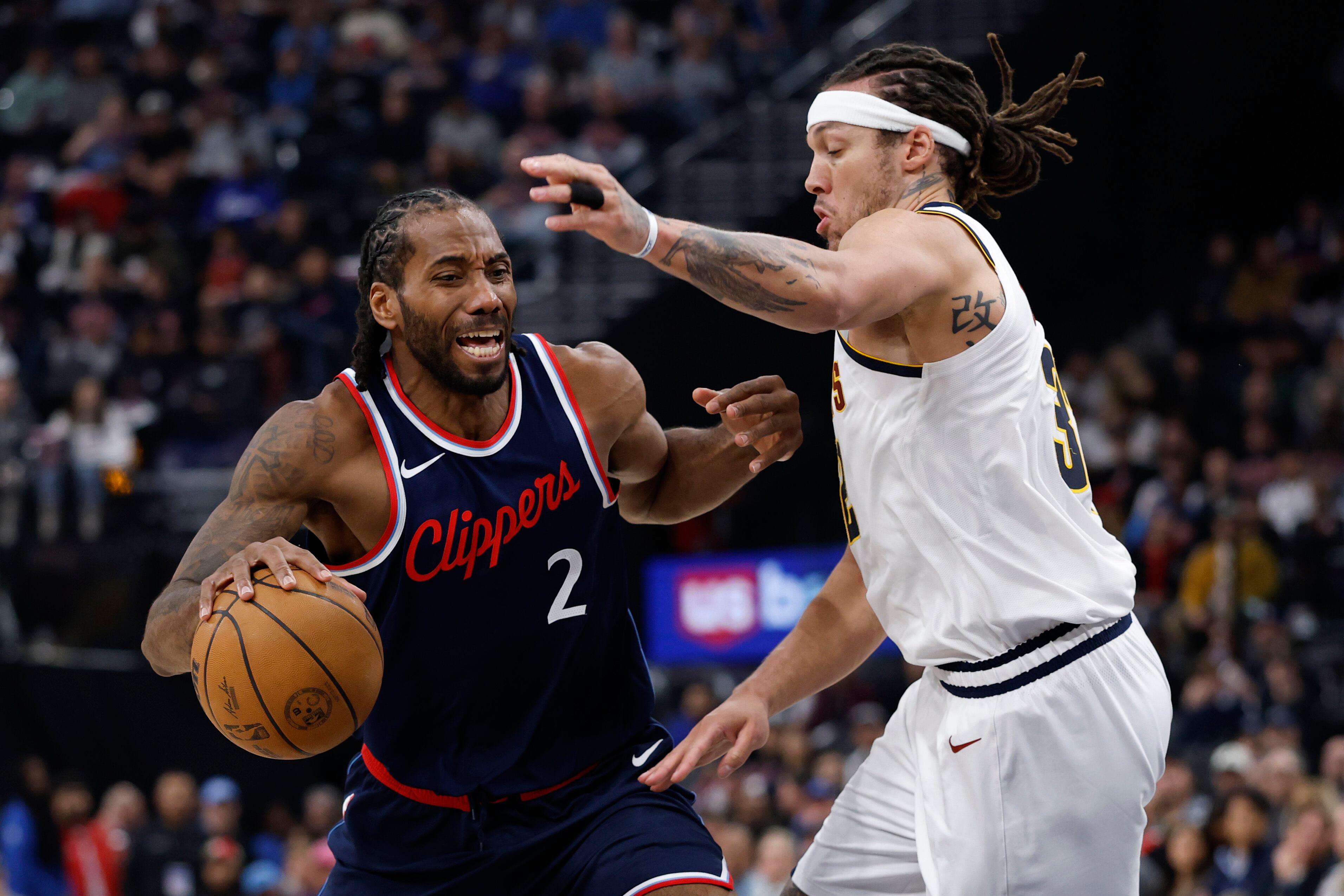 INGLEWOOD, CALIFORNIA - MAY 01: Aaron Gordon #32 of the Denver Nuggets defends against Kawhi Leonard #2 of the LA Clippers during the second quarter in Game Six of the Western Conference First Round NBA Playoffs at Intuit Dome on May 01, 2025 in Inglewood, California. NOTE TO USER: User expressly acknowledges and agrees that, by downloading and or using this photograph, User is consenting to the terms and conditions of the Getty Images License Agreement. (Photo by Harry How/Getty Images)