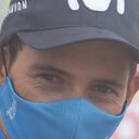 Team Movistar's Colombian rider Miguel Angel Lopez celebrates on the podium after winning the 18th stage of the 2021 La Vuelta cycling tour of Spain, a 162.6 km race from Salas to Altu d'El Gamoniteiru in Pola de Lena, on September 2, 2021. (Photo by MIGUEL RIOPA / AFP)