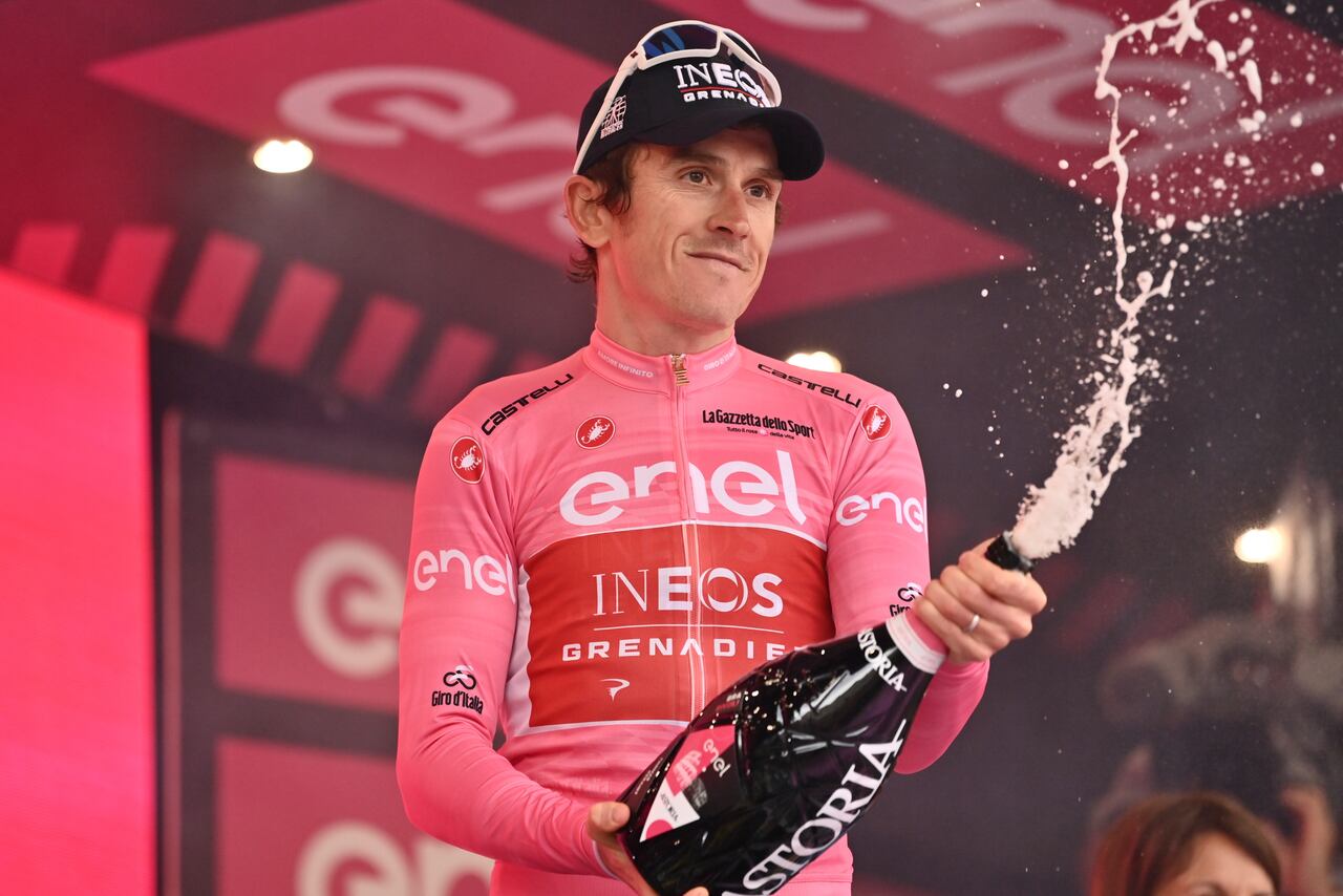 Race's overall leader Geraint Thomas celebrates on podium after completing the 12th stage of the Giro D'Italia, tour of Italy cycling race, from Bra to Rivoli, Thursday, May 18, 2023. (Massimo Paolone/LaPresse via AP)