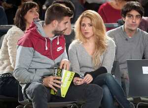 BARCELONA, SPAIN - NOVEMBER 29: Gerard Pique, FC Barcelona soccer player and his partner singer Shakira attend the 2013-2014 Turkish Airlines Euroleague Regular Season Date 7 game between FC Barcelona Regal v Fenerbahce Ulker Istanbul at Palau Blaugrana on November 29, 2013 in Barcelona, Spain. (Photo by Rodolfo Molina/Euroleague Basketball via Getty Images)