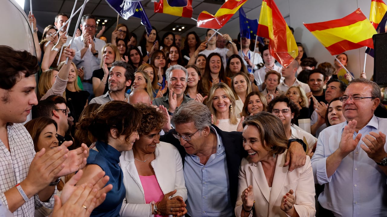 (From L) Madrid Regional President Isabel Diaz Ayuso, Dolors Montserrat, right-wing opposition party Partido Popular candidate for the European elections, PP leader Alberto Nunez Feijoo and PP Secretary General Cuca Gamarra pose for pictures during a press conference after the results of the European Parliament elections, in Madrid on June 9, 2024. Spain's right-wing Popular Party (PP) won today's EU vote in the country, just beating Prime Minister Pedro Sanchez's Socialists, official results showed. With almost all ballots counted, the opposition PP won 22 seats with 34.2 percent of the votes, ahead of the Socialist Party which secured 20 seats after securing 30.2 percent. The far-right Vox came in third, securing six seats, or 9.6 percent of the votes, up from four seats in 2019. (Photo by OSCAR DEL POZO / AFP)