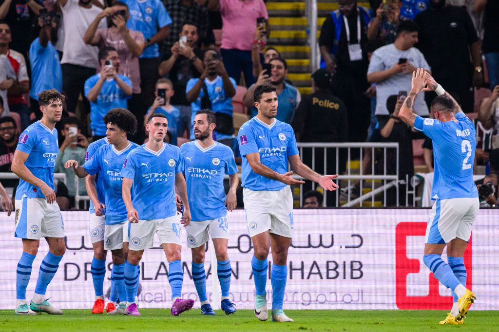 JEDDAH, SAUDI ARABIA - DECEMBER 22: Phil Foden of Manchester City (C) celebrating his goal with his teammates during the FIFA Club World Cup Final match between Manchester City and Fluminense at King Abdullah Sports City on December 22, 2023 in Jeddah, Saudi Arabia. (Photo by Marcio Machado/Eurasia Sport Images/Getty Images)