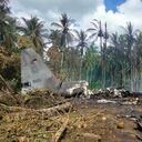 In this handout photo taken on July 4, 2021 and received from the Philippine military Joint Task Force-Sulu (JTF-Sulu), smoke billows from the wreckage of a Philippine Airforce C-130 transport plane after it crashed near the airport in Jolo town, Sulu province on the southern island of Mindanao. (Photo by Handout / Joint Task Force-Sulu / AFP) / -----EDITORS NOTE --- RESTRICTED TO EDITORIAL USE - MANDATORY CREDIT "AFP PHOTO / JOINT TASK FORCE-SULU (JTF-SULU) " - NO MARKETING - NO ADVERTISING CAMPAIGNS - DISTRIBUTED AS A SERVICE TO CLIENTS
