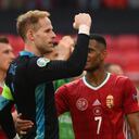 Hungary's goalkeeper Peter Gulacsi and his teammates celebrate after the UEFA EURO 2020 Group F football match between Hungary and France at Puskas Arena in Budapest on June 19, 2021. (Photo by FRANCK FIFE / POOL / AFP)