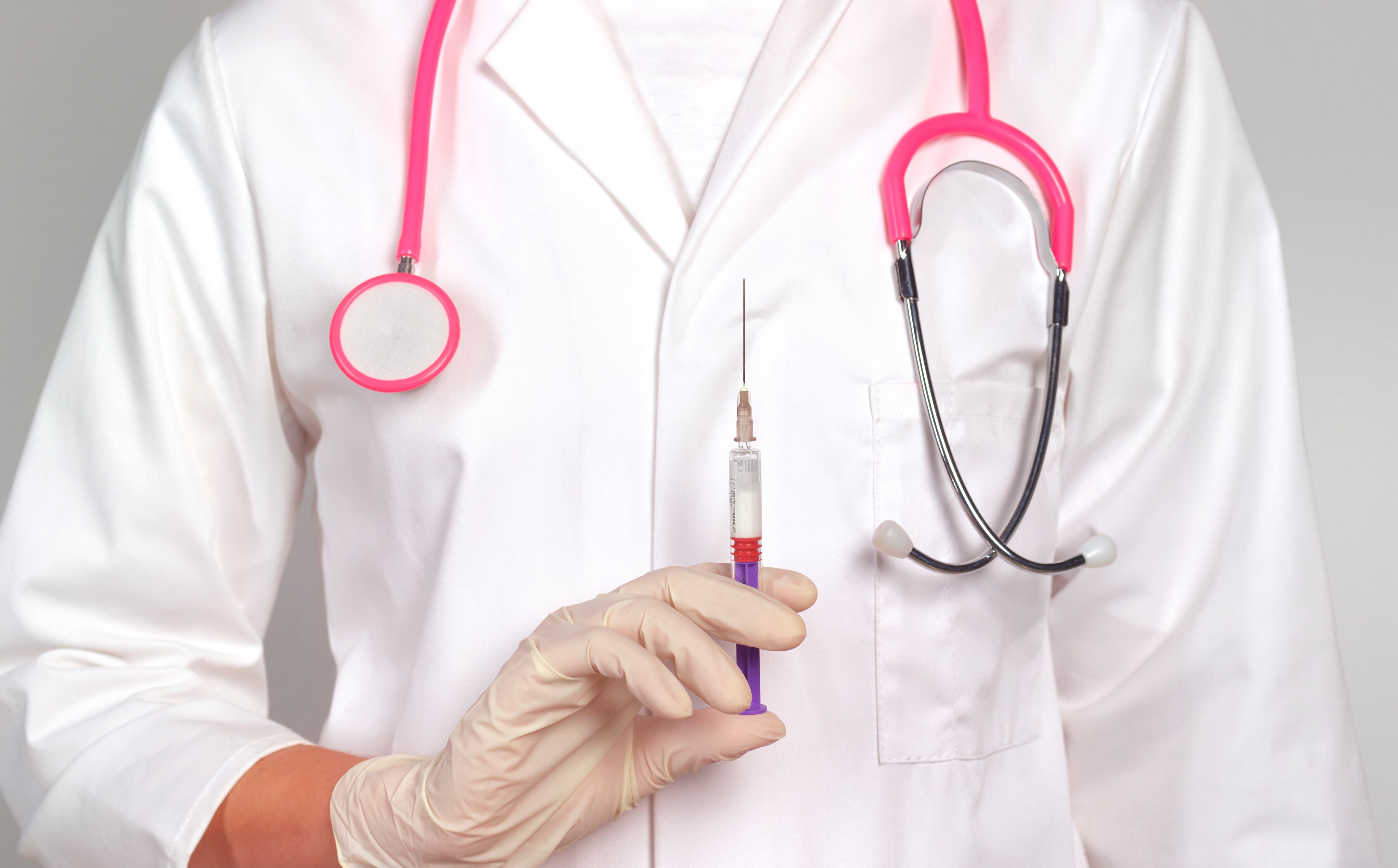 Doctor giving a contraceptive injection