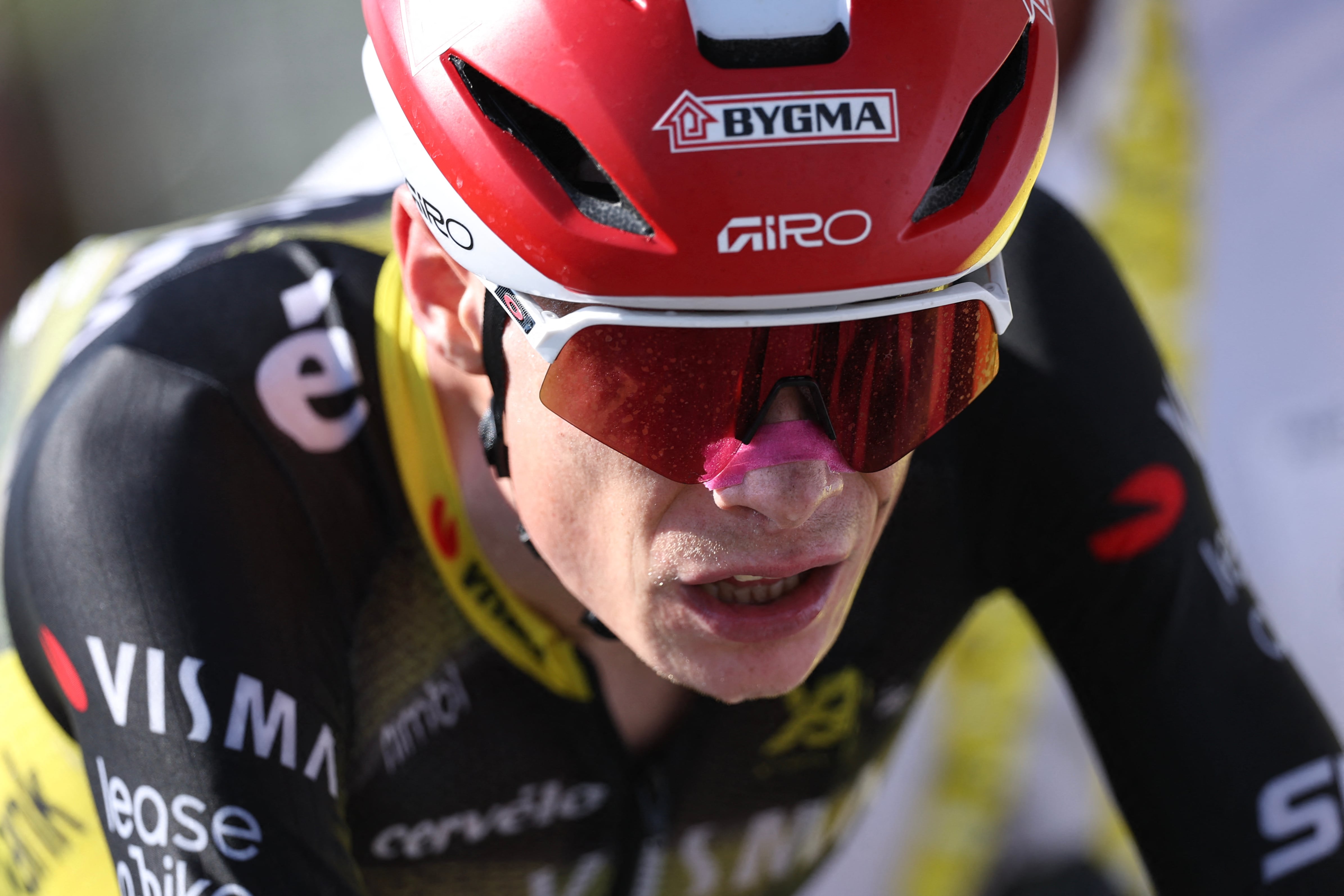 Team Visma - Lease a bike team's Danish rider Jonas Vingegaard cycles to the finish line of the 12th stage of the 112th edition of the Tour de France cycling race, 180.6 km between Auch and Hautacam, in the Pyrenees mountains of southwestern France, on July 17, 2025. (Photo by Anne-Christine POUJOULAT / AFP)
