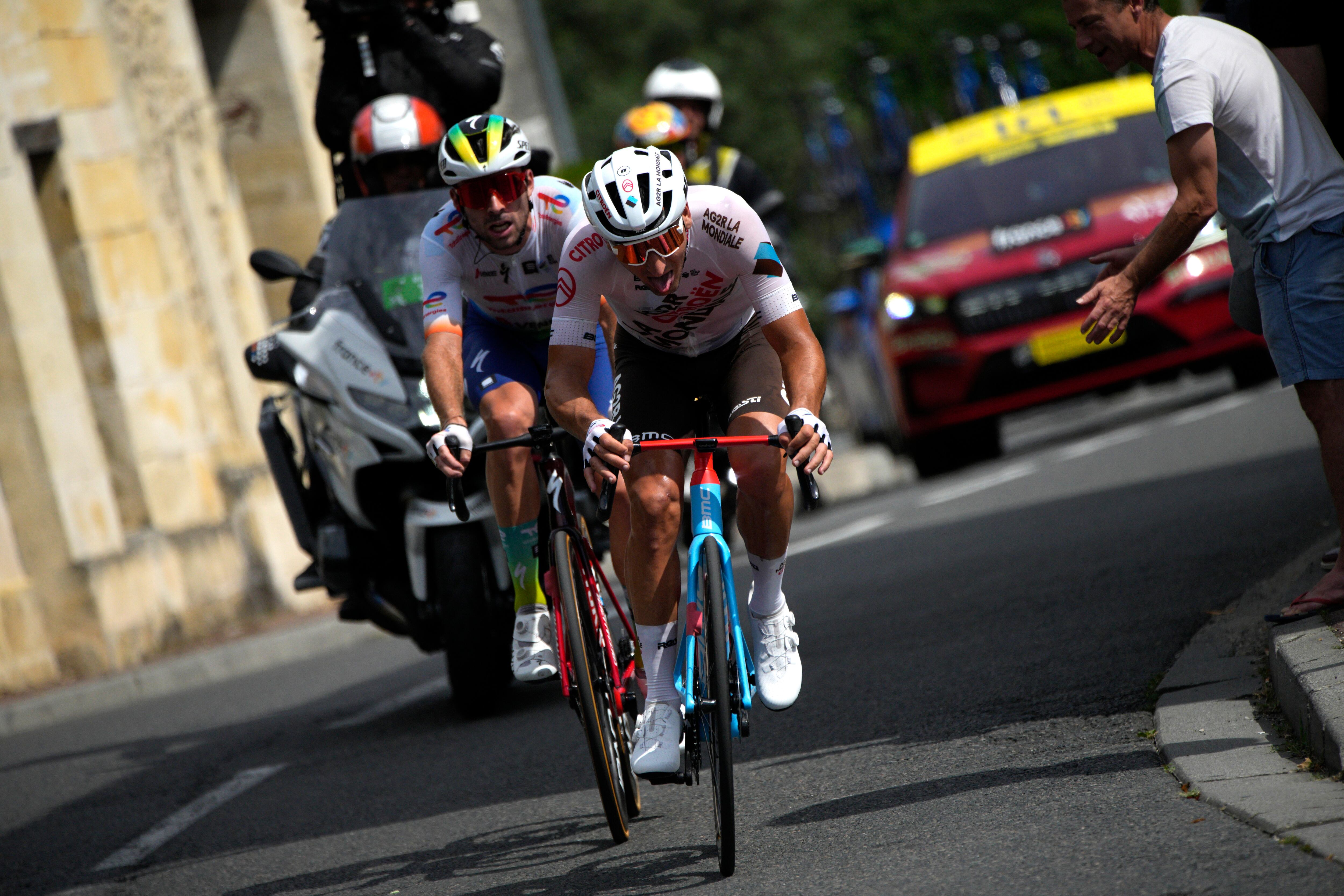 France's Nans Peters, right, and France's Pierre Latour ride in a breakaway during the seventh stage of the Tour de France cycling race over 170 kilometers (105.5 miles) with start in Mont-de-Marsan and finish in Bordeaux, France, Friday, July 7, 2023. (AP Photo/Daniel Cole)