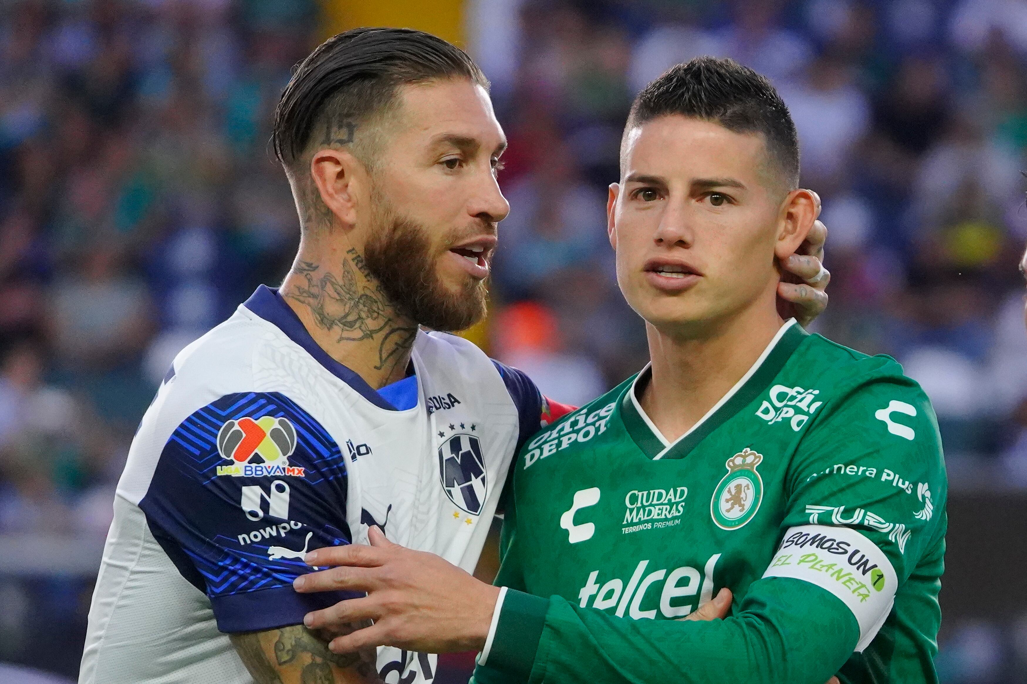 LEON, MEXICO - APRIL 20: Sergio Ramos (L) of Monterrey and James Rodriguez (R) of Leon hug during the 17th round match between Leon and Monterrey as part of the Torneo Clausura 2025 Liga MX at Leon Stadium on April 20, 2025 in Leon, Mexico. (Photo by Luis Cano/Jam Media/Getty Images)