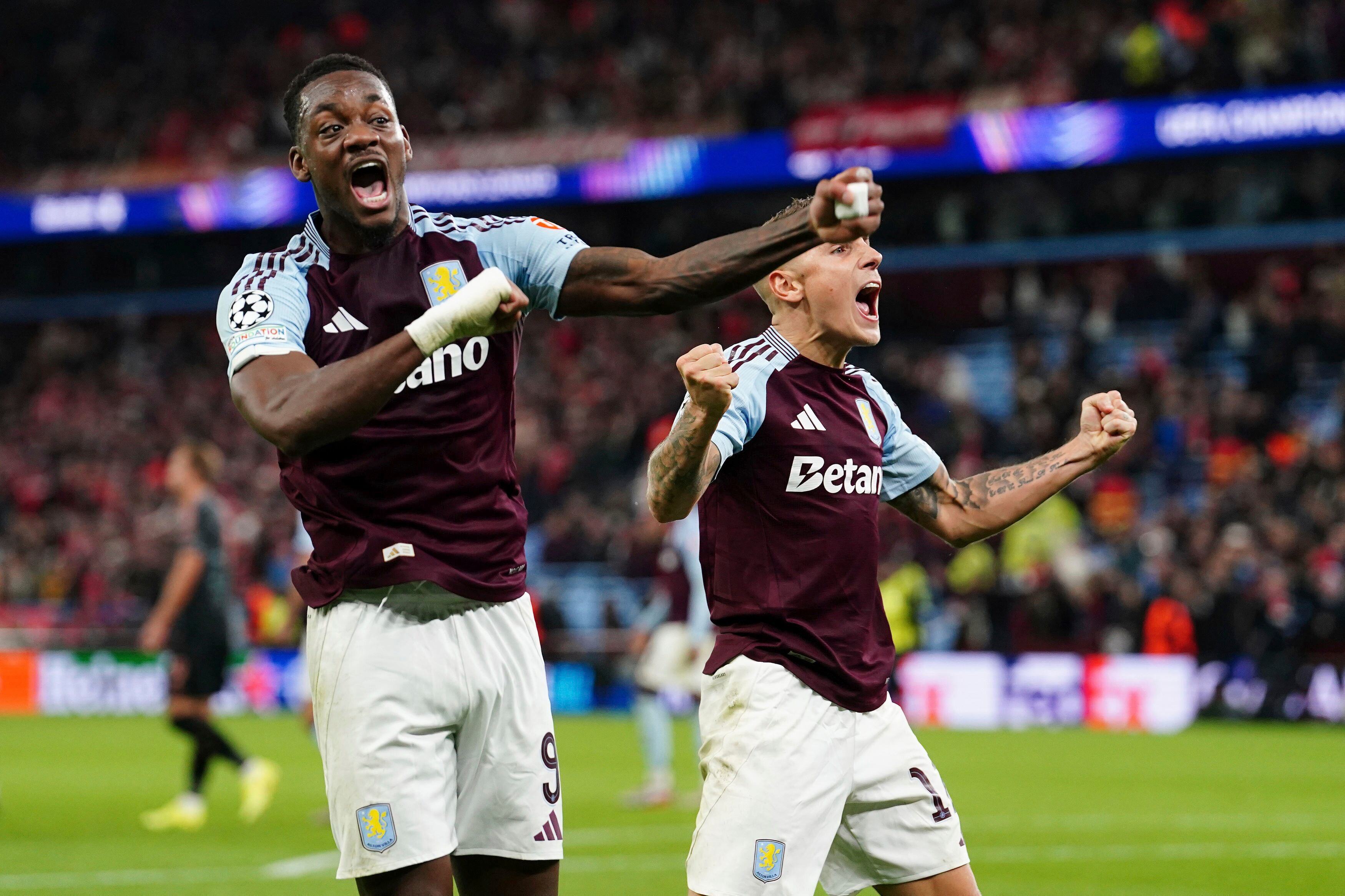 Aston Villa's Jhon Duran, left, and Lucas Digne celebrate after the Champions League opening phase soccer match between Aston Villa and Bayern Munich, at Villa Park in Birmingham, England, Wednesday, Oct. 2, 2024. (David Davies/PA via AP)