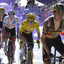 Sepp Kuss of the U.S., Denmark's Jonas Vingegaard, wearing the overall leader's yellow jersey, Slovenia's Tadej Pogacar, wearing the best young rider's white jersey, and Britain's Geraint Thomas, from right, climb Alpe d'Huez during the twelfth stage of the Tour de France cycling race over 165.5 kilometers (102.8 miles) with start in Briancon and finish in Alpe d'Huez, France, Thursday, July 14, 2022. (Bernard Papon/Pool Photo via AP)