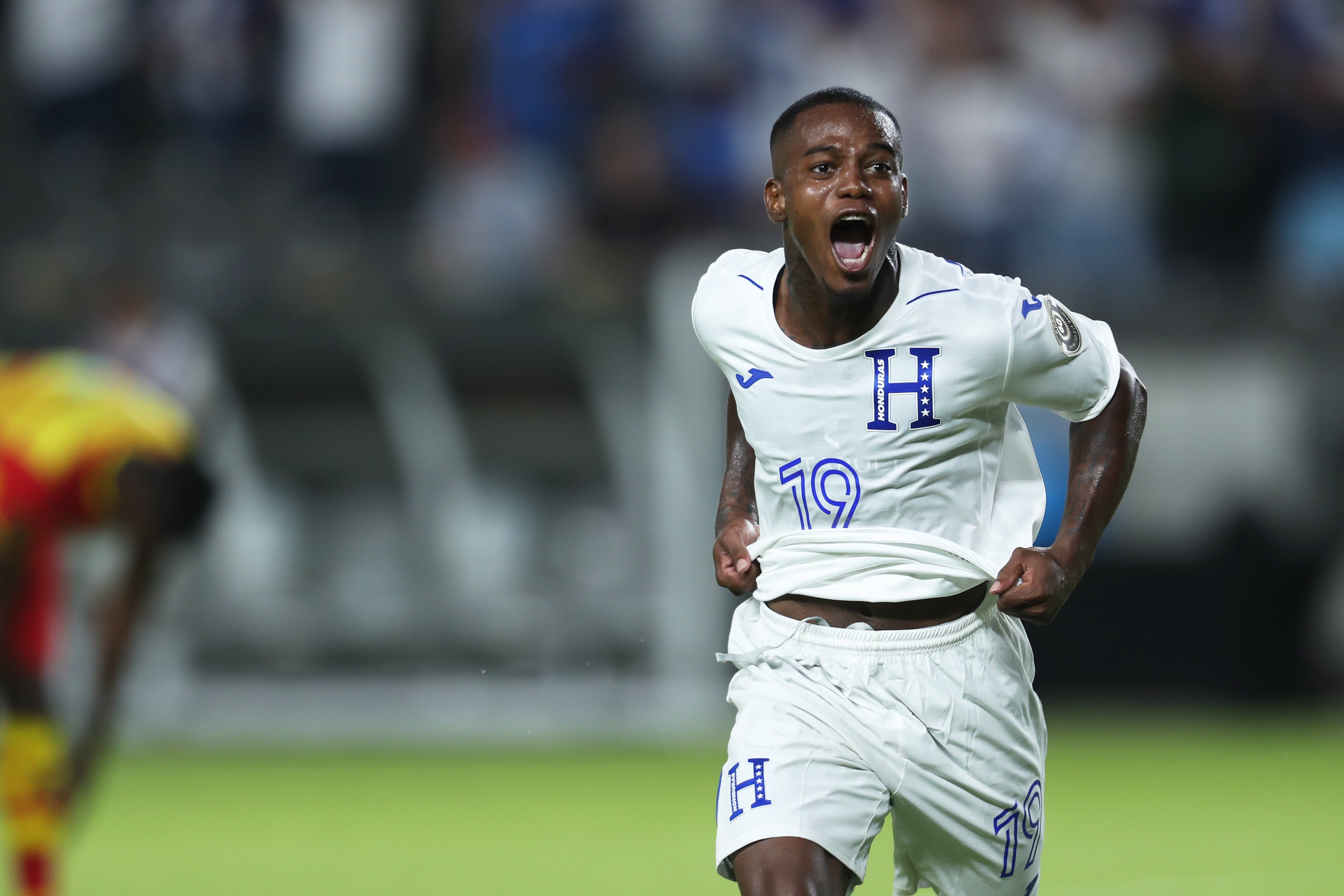 HOUSTON, TX - JULY 13: Edwin Solano #19 of Honduras celebrates after scoring 2nd goal during a Group D match between Honduras and Grenada as part of 2021 CONCACAF Gold Cup at BBVA Stadium on July 13, 2021 in Houston, Texas. (Photo by Omar Vega/Getty Images)