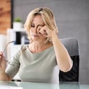 Woman Eye Fatigue And Pain. Tired Working On PC