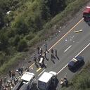 Emergency responders work the scene of a fatal bus crash, in Wawayanda, N.Y., Thursday, Sept. 21, 2023. The charter bus carrying high school students to a band camp hurtled off a New York highway and down an embankment, officials said. (NBC New York via AP)