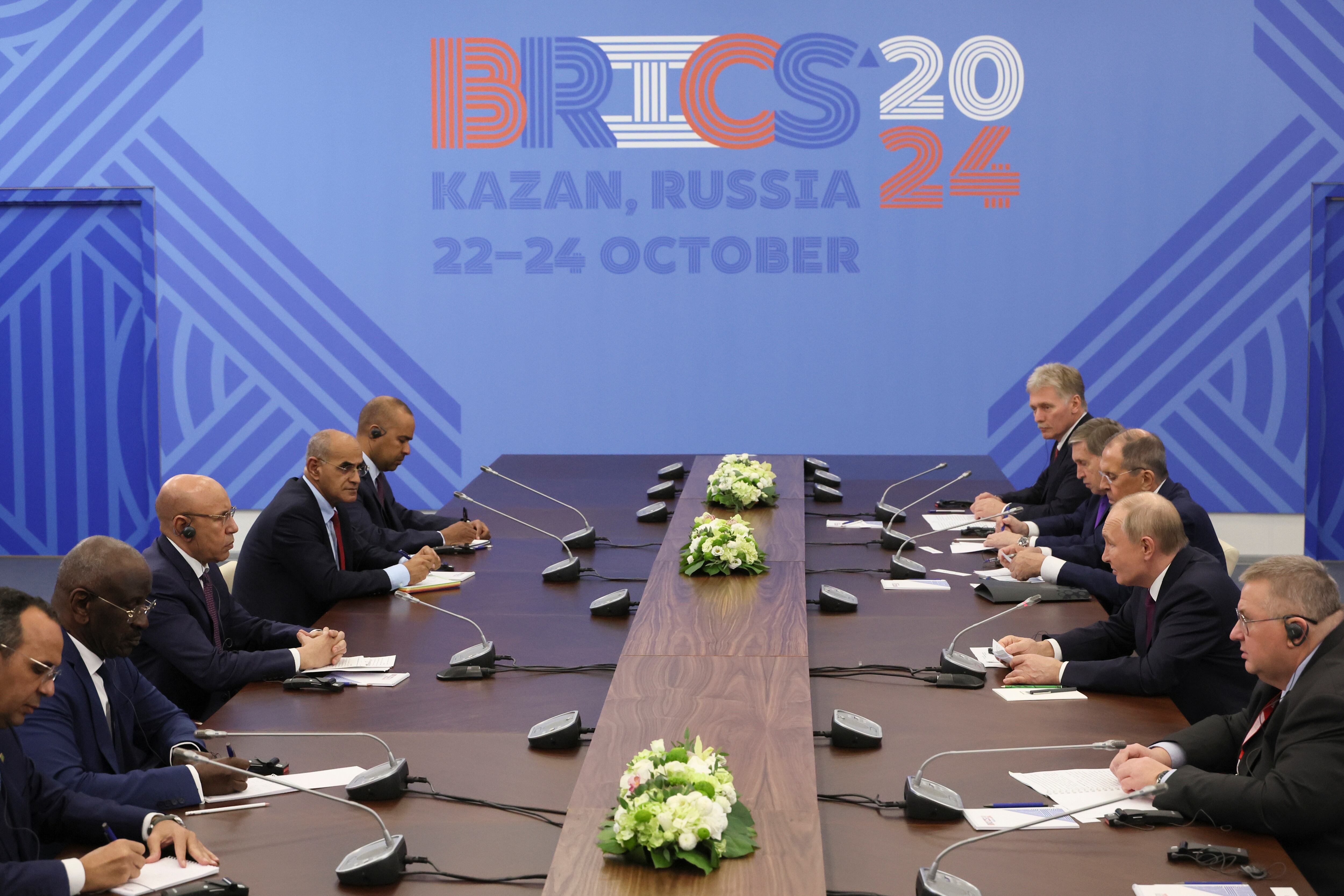 Russian President Vladimir Putin, 2nd right, attends a meeting with Mauritania's President Mohamed Ould Ghazouani, 3rd left, on the sidelines of the BRICS summit in Kazan, Russia, Thursday, Oct. 24, 2024. (Maxim Shipenkov, Pool Photo via AP)