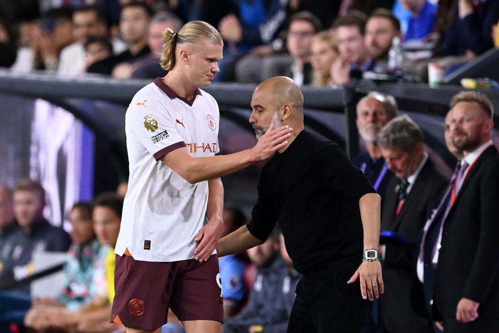 Erling Haaland y Pep Guardiola