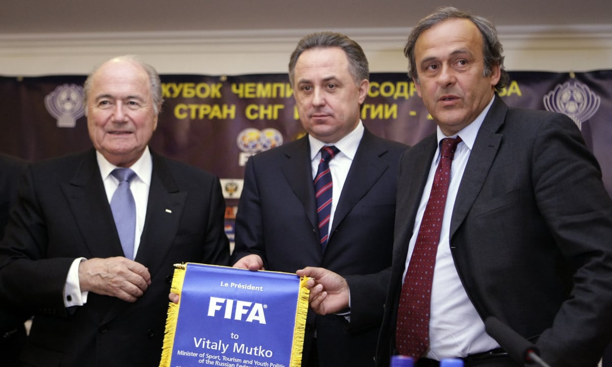 Then FIFA president Sepp Blatter, Russian Sports Minister Vitaly Mutko, who was the Russian Football Union president in 2005-2009, and then UEFA president Michel Platini are seen in Moscow. Former FIFA officials Sepp Blatter and Michel Platini will go on trial charged with fraud and other offenses in June, it was announced Tuesday, April 12, 2022. Switzerland’s federal criminal court says the trial will be heard before a panel of three judges on 11 days between June 8 and 22. (AP , file)