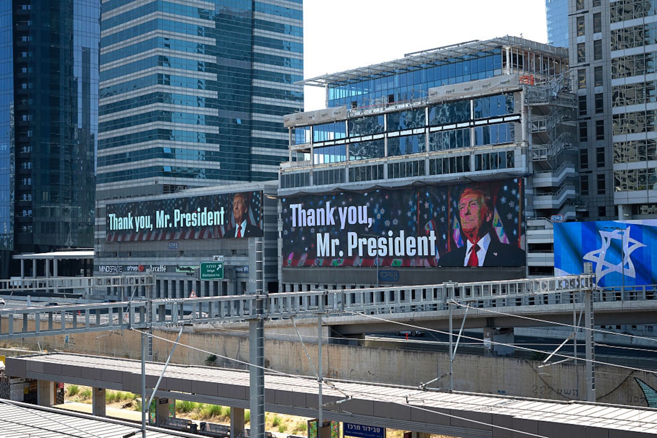 TEL AVIV, ISRAEL - JUNE 22: Digital billboards display a message thanking US President Donald Trump for his administration's strikes on Iranian nuclear sites on June 22, 2025 in Tel Aviv, Israel. Israel was hit with a fresh wave of aerial attacks by Iran after the US entered the war overnight and bombed several locations in Iran. (Photo by Erik Marmor/Getty Images)
