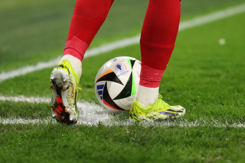 CARDIFF, WALES - MARCH 26: Harry Wilson of Wales stands over the Adidas Fussballliebe Pro, official match ball of the UEFA European Championships 2024, during the UEFA EURO 2024 Play-Offs Final match between Wales and Poland at Cardiff City Stadium on March 26, 2024 in Cardiff, Wales. (Photo by Jan Kruger - UEFA/UEFA via Getty Images)