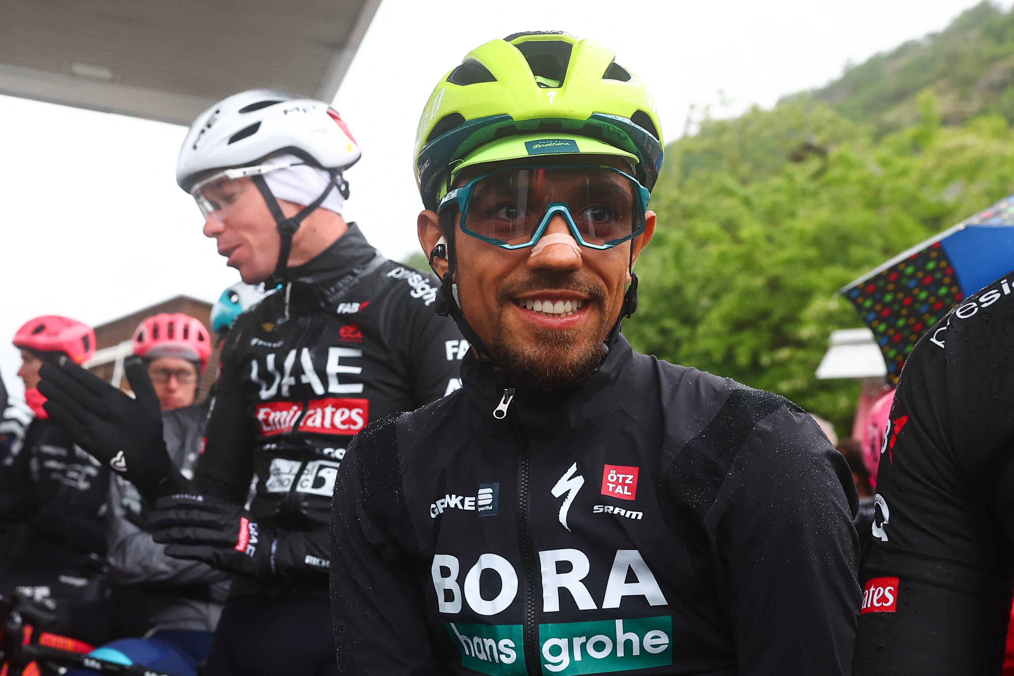 Team Bora's Colombian rider Daniel Martinez waits for the start of the race during the 16th stage of the 107th Giro d'Italia cycling race, 206km between Livigno and Santa Cristina Val Gardena on May 21, 2024. Due to bad weather condition, the route changed and the start takes place in Lasa. (Photo by Luca Bettini / AFP)