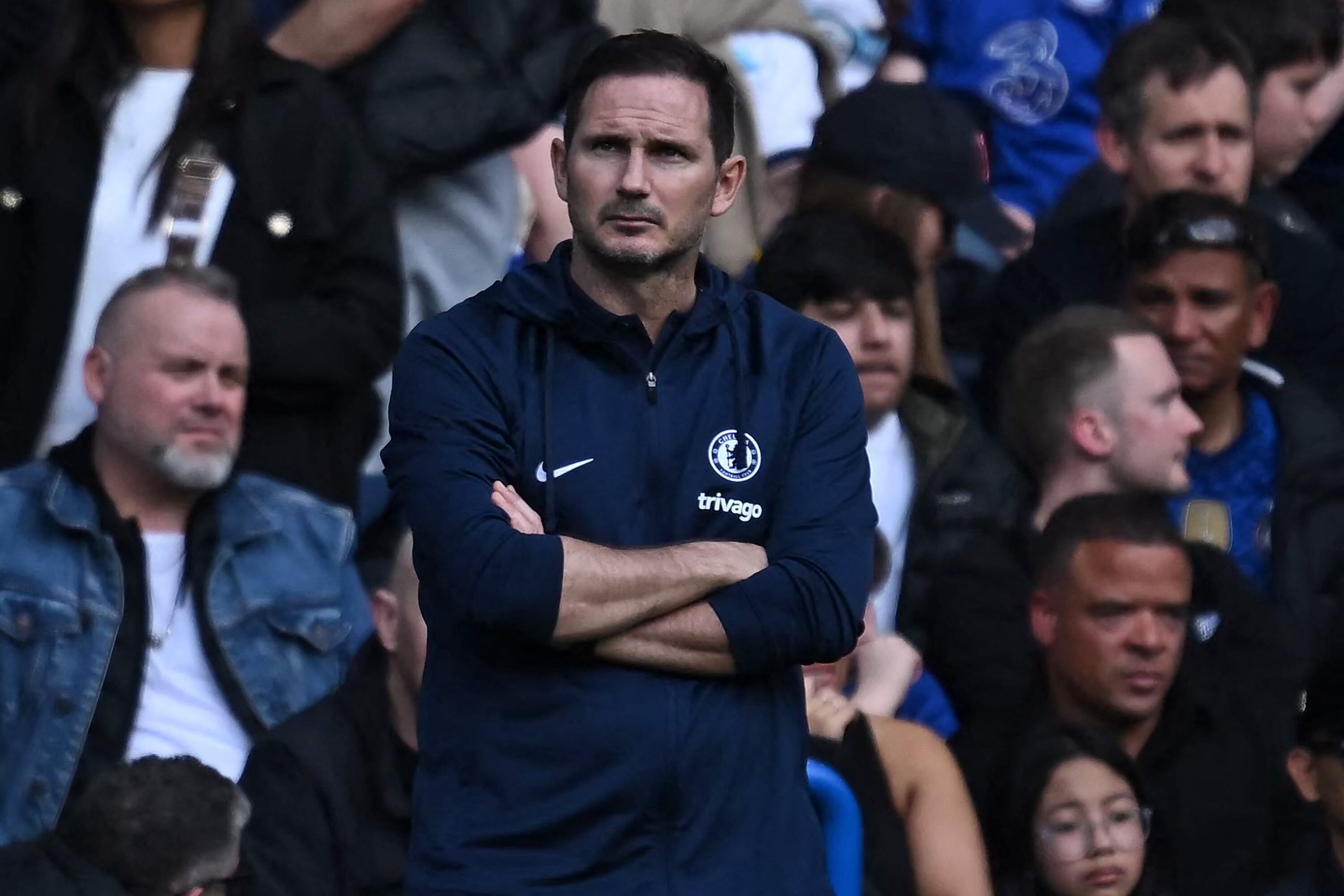 Chelsea's English caretaker manager Frank Lampard looks on during the English Premier League football match between Chelsea and Brighton and Hove Albion at Stamford Bridge in London on April 15, 2023. (Photo by Ben Stansall / AFP) / RESTRICTED TO EDITORIAL USE. No use with unauthorized audio, video, data, fixture lists, club/league logos or 'live' services. Online in-match use limited to 120 images. An additional 40 images may be used in extra time. No video emulation. Social media in-match use limited to 120 images. An additional 40 images may be used in extra time. No use in betting publications, games or single club/league/player publications. /
