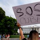 WASHINGTON, DC - JULY 18: A demonstrator gathers with others in solidarity with protests in Cuba outside the White House on July 18, 2021 in Washington, DC. The protests come amid demonstrations in Cuba over the lack of food, the pace of Covid-19 vaccinations and the government. Stefani Reynolds/Getty Images/AFP (Photo by Stefani Reynolds / GETTY IMAGES NORTH AMERICA / Getty Images via AFP)