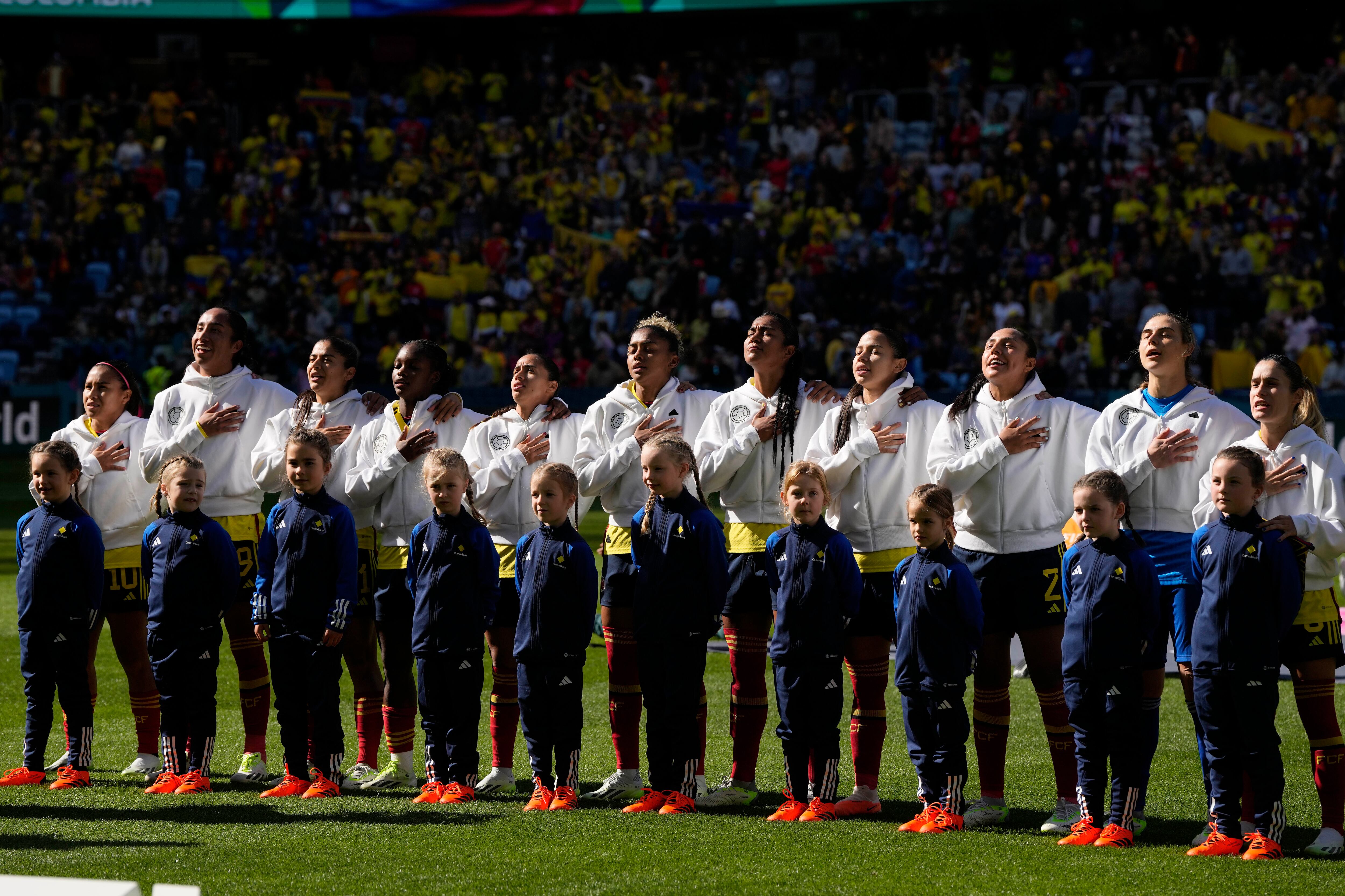 Colombia's team sing the national anthem before the start of the Women's World Cup Group H soccer match between Colombia and South Korea at the Sydney Football Stadium in Sydney, Australia, Tuesday, July 25, 2023. (AP Photo/Rick Rycroft)