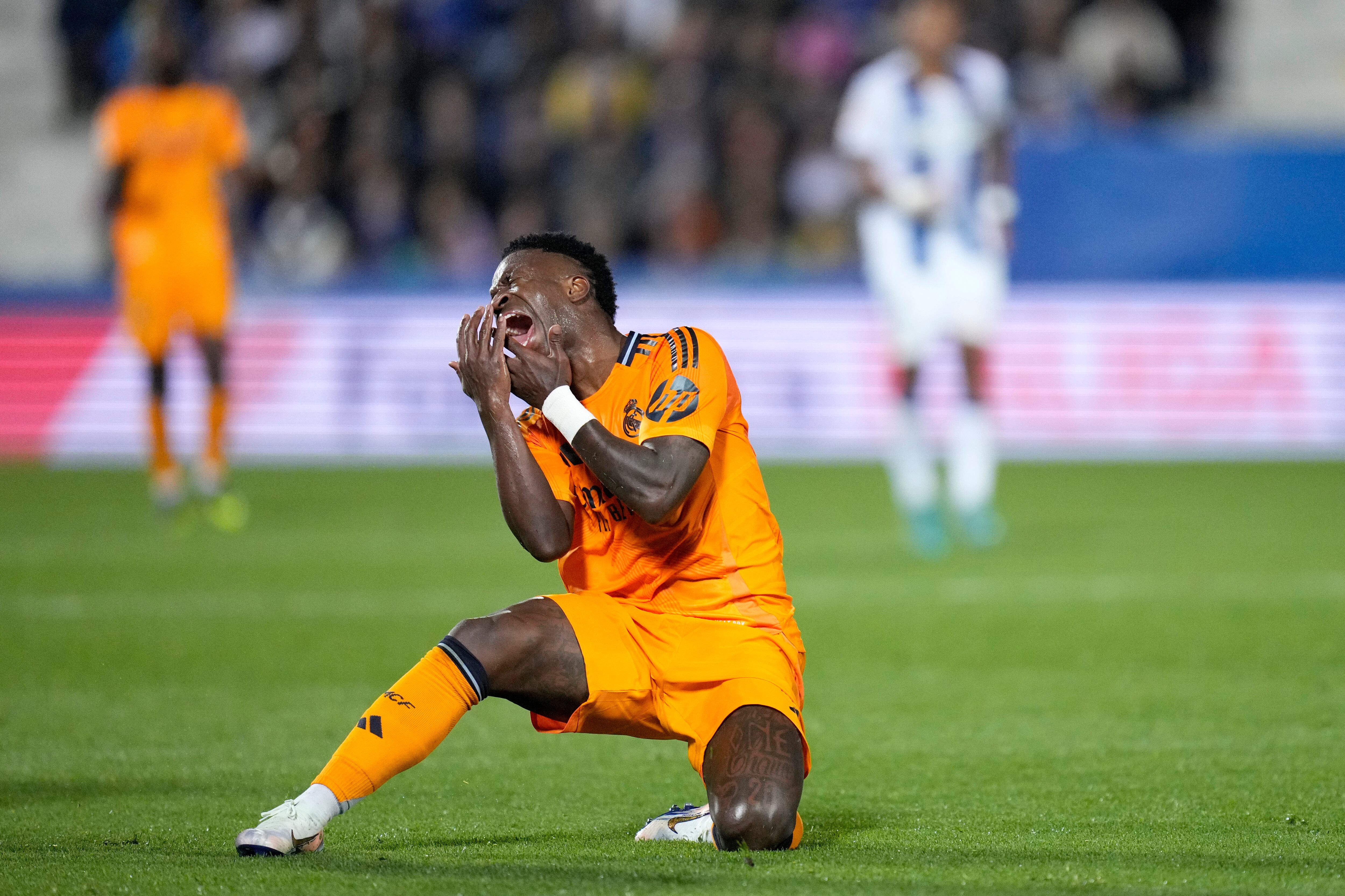 Real Madrid's Vinicius Junior reacts during a Spanish La Liga soccer match between CD Leganes and Real Madrid in Leganes, outside Madrid, Sunday, Nov. 24, 2024. (AP Photo/Bernat Armangue)
