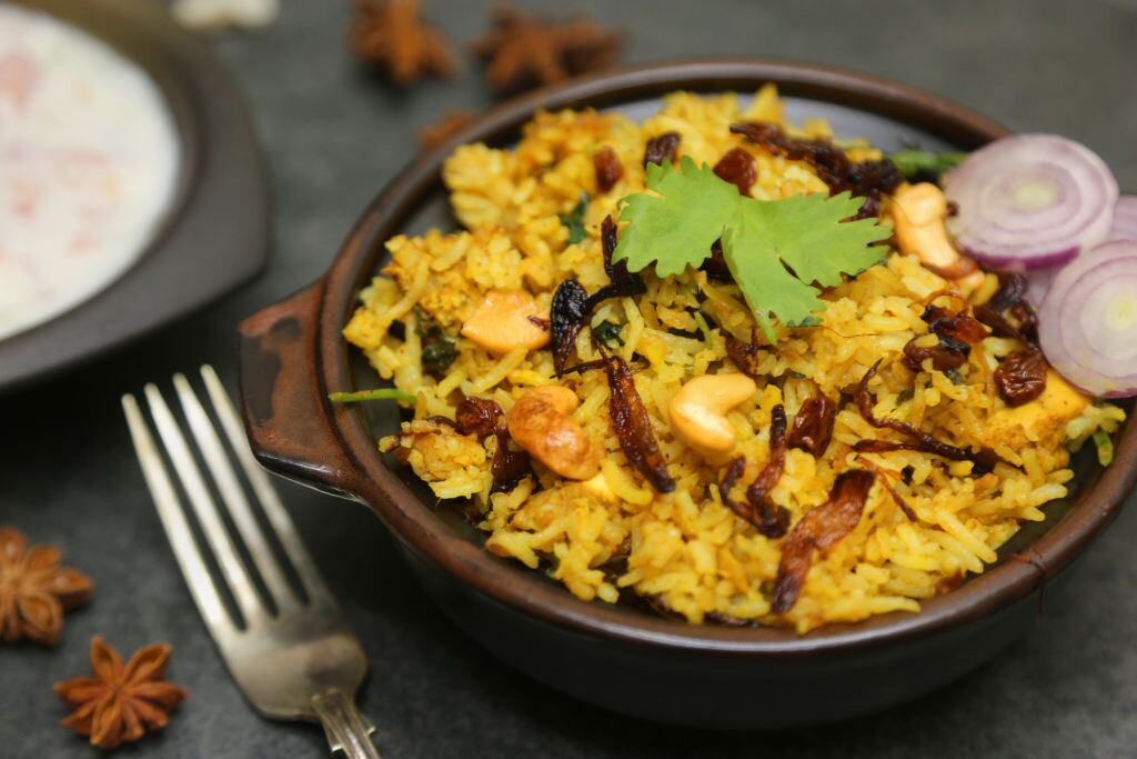 TORONTO, ON - MAY 11: Toronto chef Steven Gonzales of Valdez (Latino street food) and his arroz con pollo at the Terroir Symposium event being held at the Arcadian Court in Toronto. (Vince Talotta/Toronto Star via Getty Images)