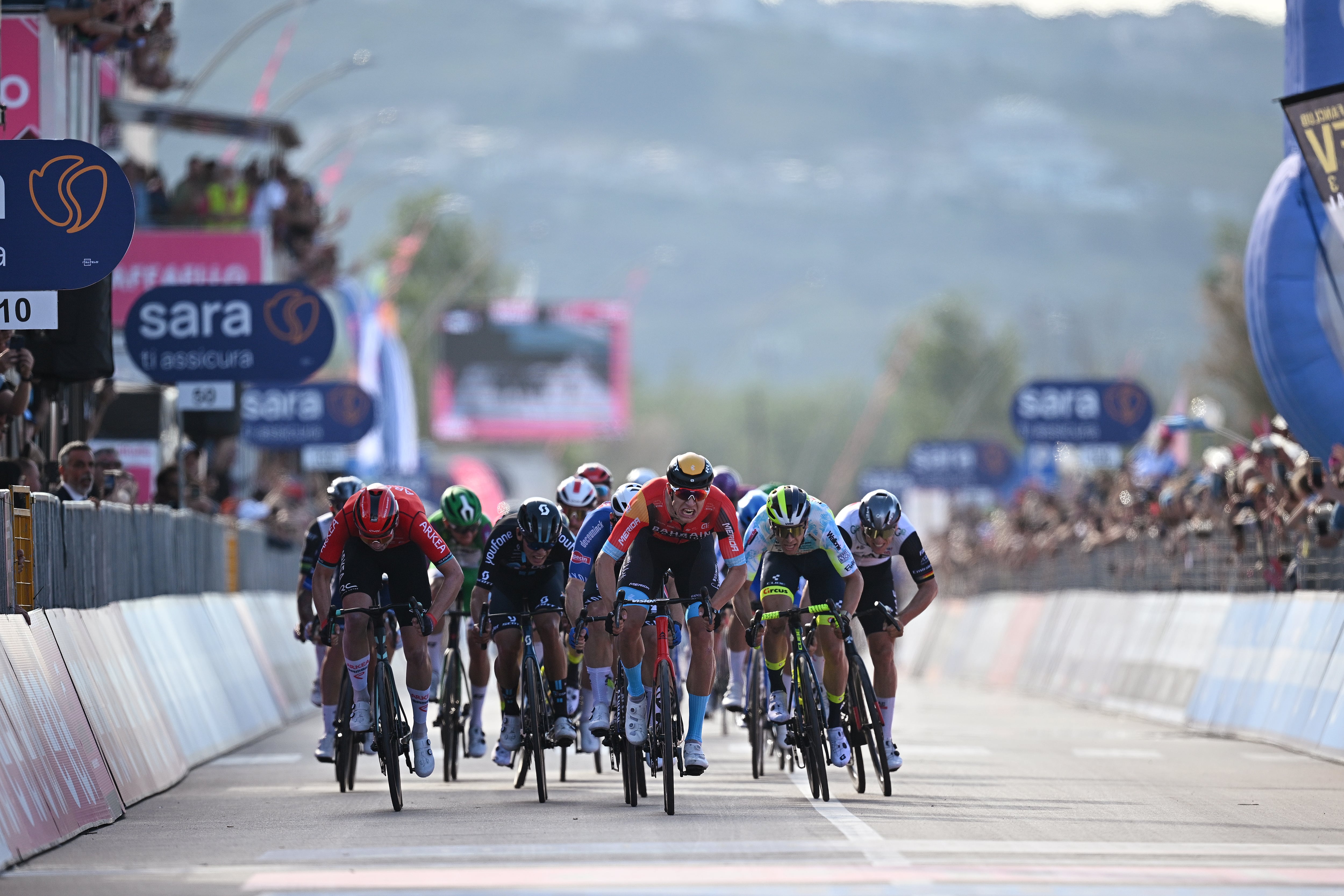 SAN SALVO, ITALY - MAY 07: Jonathan Milan of Italy and Team Bahrain - Victorious sprints at finish line to win the stage during the 106th Giro d'Italia 2023, Stage 2 a 202km stage from Teramo to San Salvo / #UCIWT / on May 07, 2023 in San Salvo, Italy. (Photo by Stuart Franklin/Getty Images,)