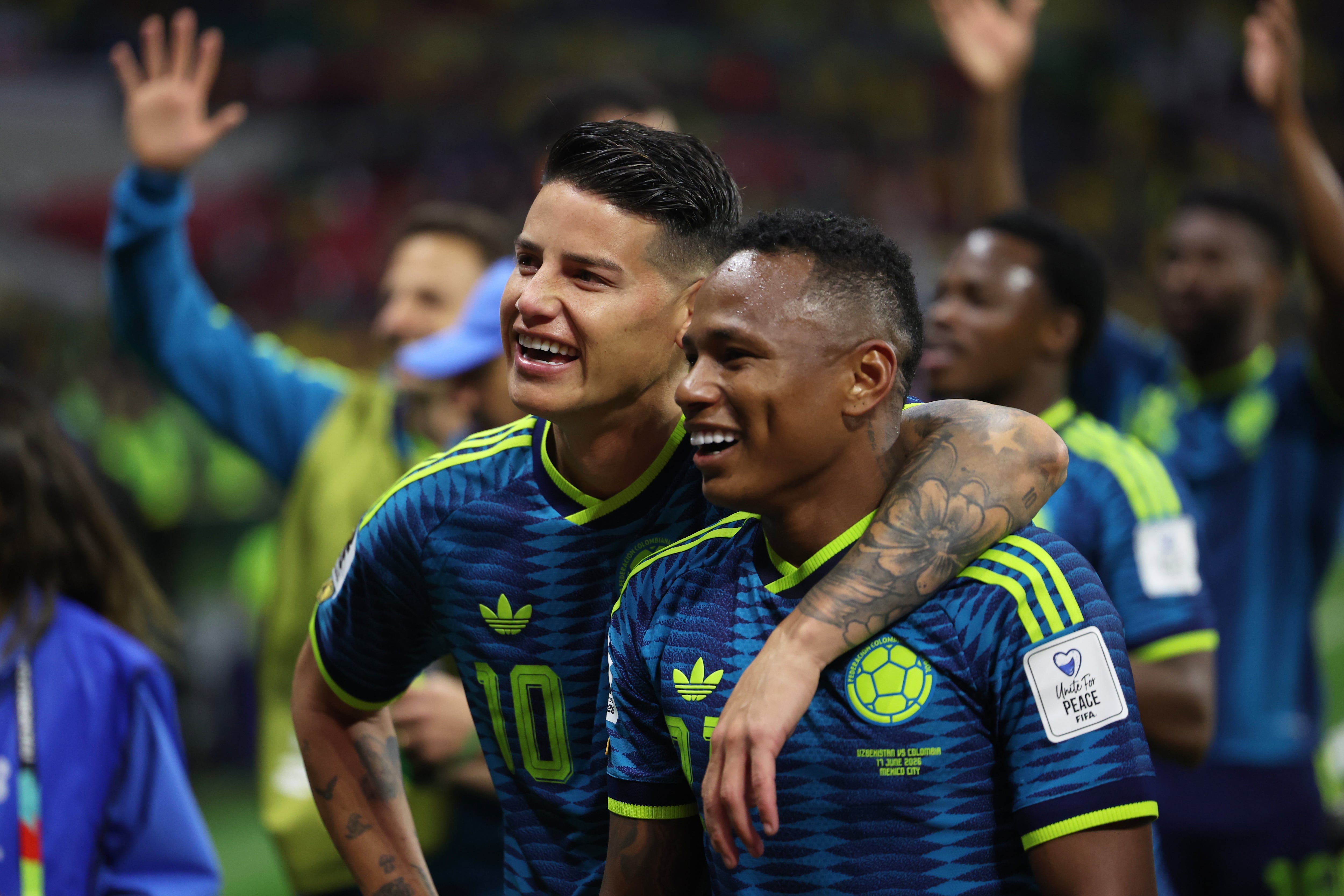 Colombia's James Rodriguez (10) and Jaminton Campaz (21) celebrate after their win in the World Cup Group K soccer match between Uzbekistan and Colombia in Mexico City, Wednesday, June 17, 2026. (AP Photo/Ashtin Barker)
