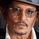 (FILES) US actor Johnny Depp arrives on the red carpet of the 47th Deauville US Film Festival in Deauville, western France, on September 5, 2021. Far from the media buzz around Ma�wenn and Johnny Depp, stars of "Jeanne du Barry" which opens the Cannes Film Festival on May 16, 2023, this film could not be more "academic, slow, classic", its director admits. (Photo by LOIC VENANCE / AFP)