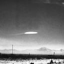 A UFO variety was photographed when it hovered for fifteen minutes near Holloman Air Development Center in New Mexico. The object was photographed by a government employee and was released by the Aerial Phenomena Research Organization after careful study. There is no conventional explanation for the object.