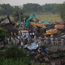 Policemen stand guard at the site where trains that derailed, in Balasore district, in the eastern Indian state of Orissa, Sunday, June 4, 2023. Indian authorities end rescue work and begin clearing mangled wreckage of two passenger trains that derailed in eastern India, killing over 300 people and injuring hundreds in one of the country’s deadliest rail crashes in decades. (AP Photo/Rafiq Maqbool)