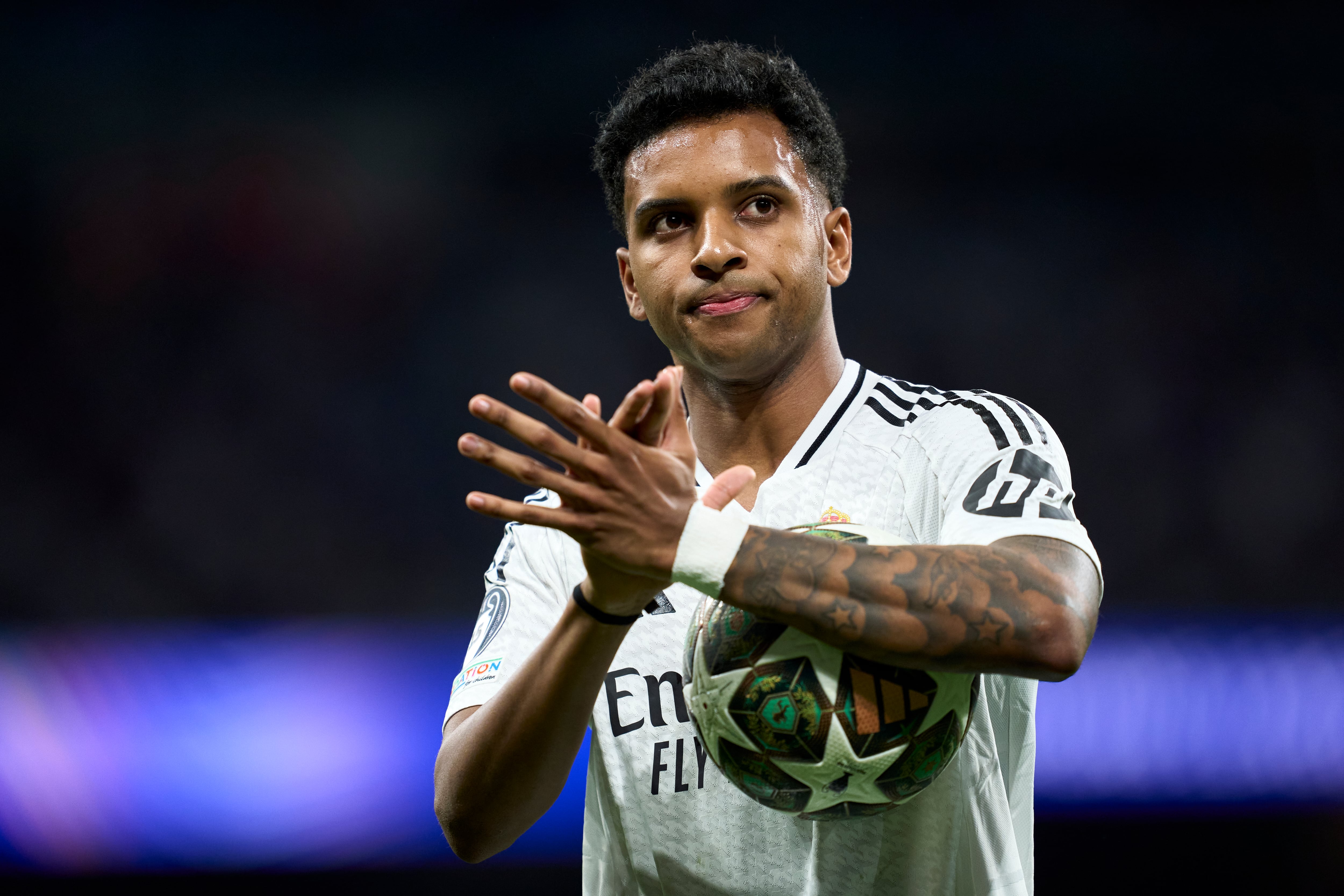 MADRID, SPAIN - FEBRUARY 19: Rodrygo Goes of Real Madrid looks on during the UEFA Champions League 2024/25 League Knockout Play-off second leg match between Real Madrid C.F. and Manchester City at Estadio Santiago Bernabeu on February 19, 2025 in Madrid, Spain. (Photo by Mateo Villalba/Getty Images)
