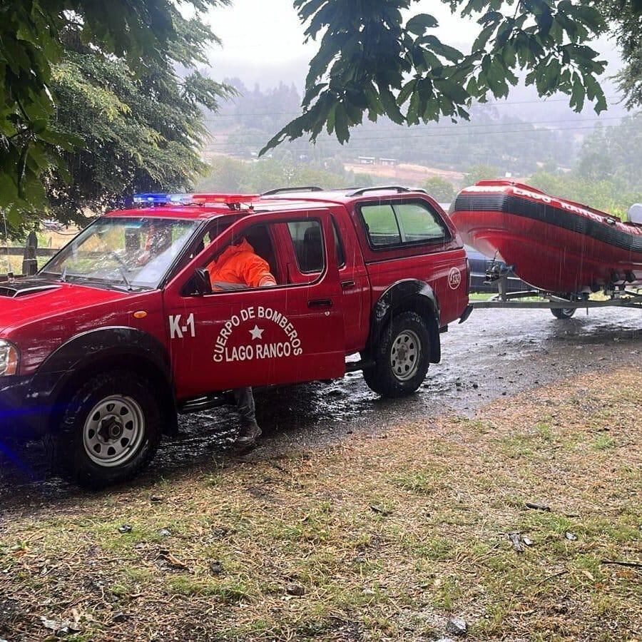 LOS RIOS, CHILE - FEBRUARY 06: (----EDITORIAL USE ONLY - MANDATORY CREDIT - FIREFIGHTERS OF CARABINEROS / HANDOUT' - NO MARKETING NO ADVERTISING CAMPAIGNS - DISTRIBUTED AS A SERVICE TO CLIENTS----) Firefighters of the Chilean Police Force Carabineros, Navy, and Health personnel are working at the scene as a private helicopter carrying former Chilean president Sebastian Pinera crashed into Lake Ranco, near Ilihue Bajo area, during rainy weather in the region of Los Rios, Chile on February 06, 2024. When the helicopter was falling, three of the occupants allegedly managed to jump and were rescued. The missing person is believed to be the pilot. (Photo by Firefighters of Carabineros / Handout/Anadolu via Getty Images)