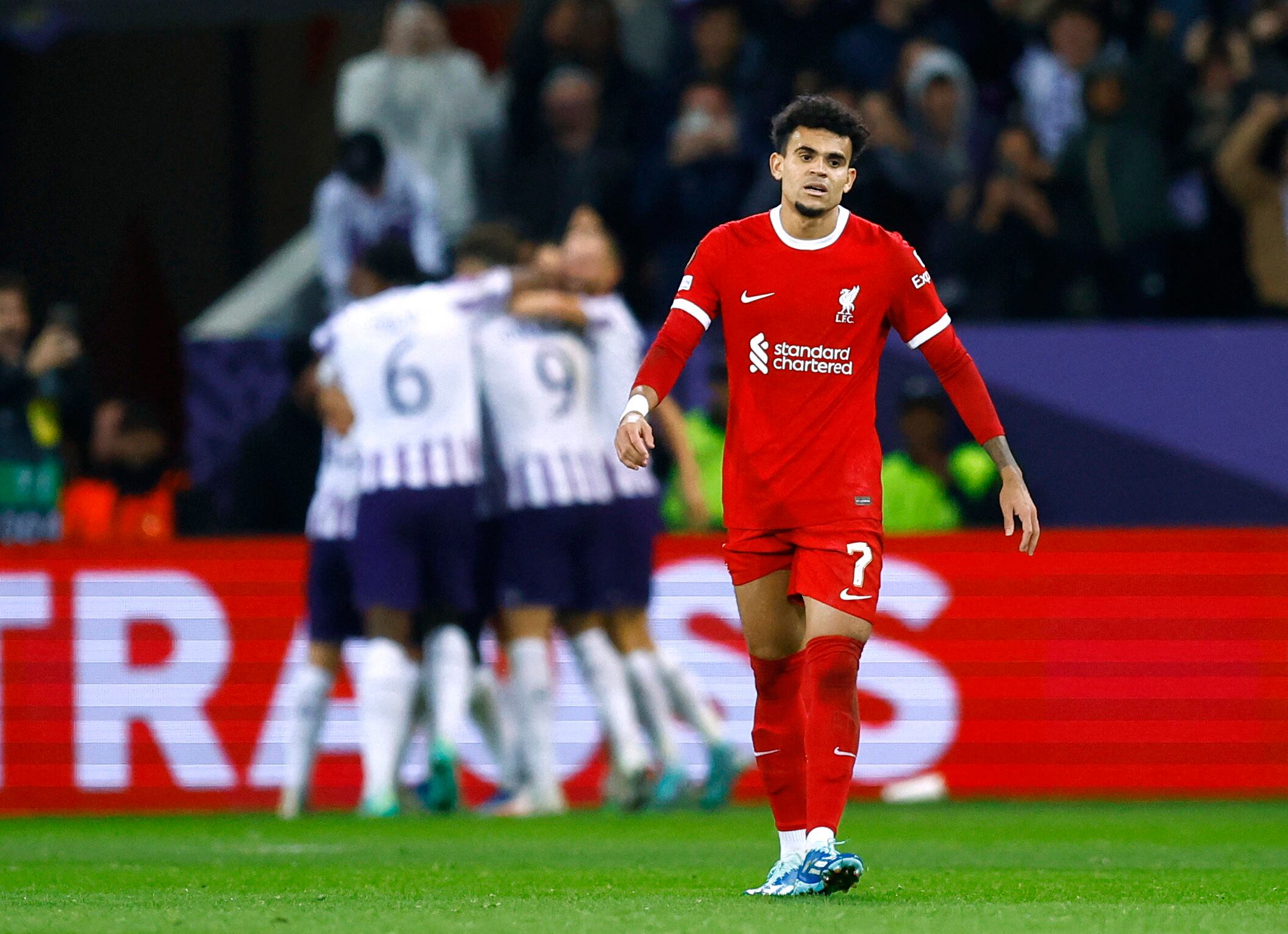 Soccer Football - Europa League - Group E - Toulouse v Liverpool - Stadium Municipal de Toulouse, Toulouse, France - November 9, 2023 Liverpool's Luis Diaz reacts as Toulouse's Frank Magri celebrates scoring their third goal with teammates REUTERS/Stephane Mahe