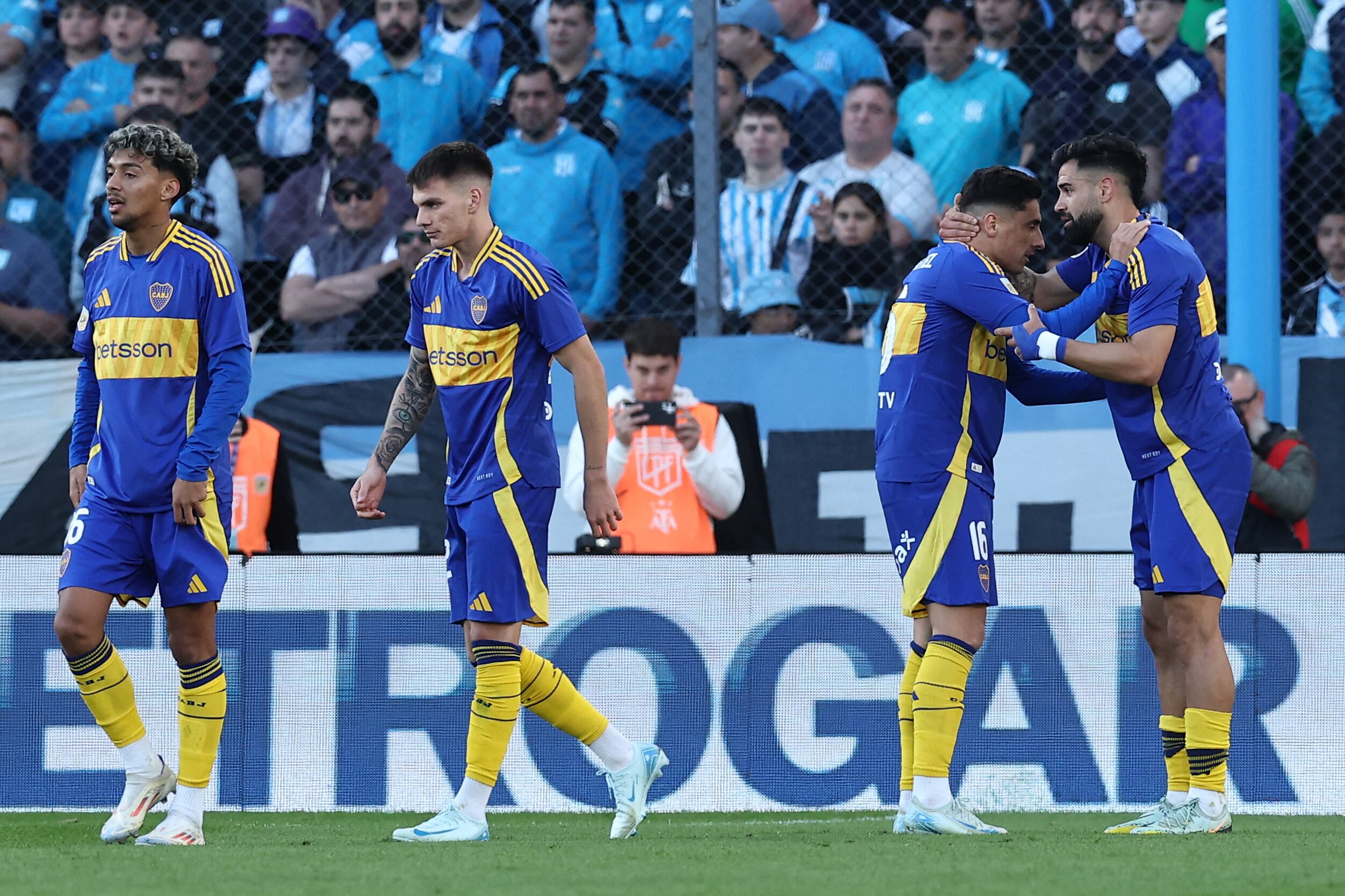 Boca Juniors' forward Milton Gimenez (R) celebrates with teammate Uruguayan forward Miguel Merentiel after scoring a goal during the Argentine Professional Football League Tournament 2024 'Cesar Luis Menotti' match between Racing Club and Boca Juniors at the Presidente Peron stadium in Avellaneda, Buenos Aires province, on September 14, 2024. (Photo by ALEJANDRO PAGNI / AFP)