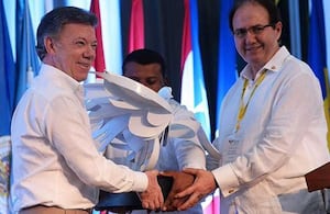 Juan Manuel Santos y Leonidas Bustos