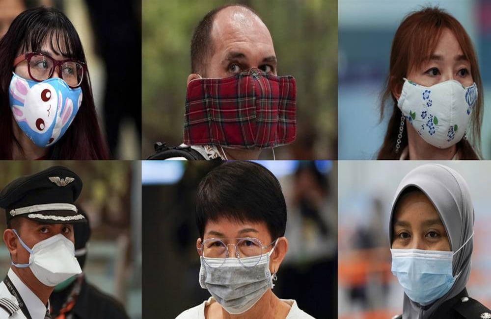 En una combinación de fotos, un grupo de personas usa diferentes máscaras mientras espera en un mostrador de inmigración en la terminal de un aeropuerto en Sepang, Malasia, el miércoles 29 de enero. Estas máscaras son escasas en algunas partes del mundo, ya que las personas intentan detener la propagación del coronavirus en China. Foto: Vincent Thian/ AP.