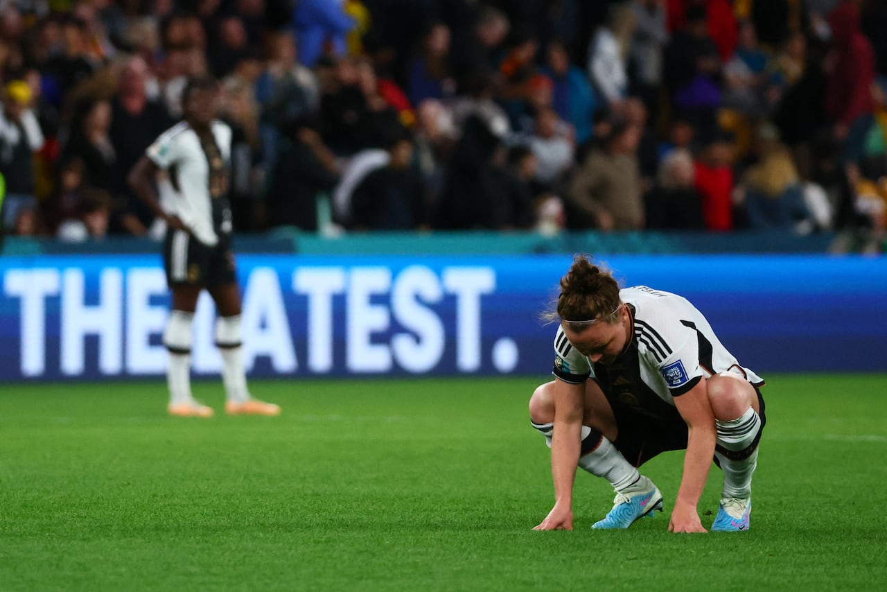 Germany's players react after a draw during the Australia and New Zealand 2023 Women's World Cup Group H football match between South Korea and Germany at Brisbane Stadium in Brisbane on August 3, 2023. (Photo by Patrick Hamilton / AFP)