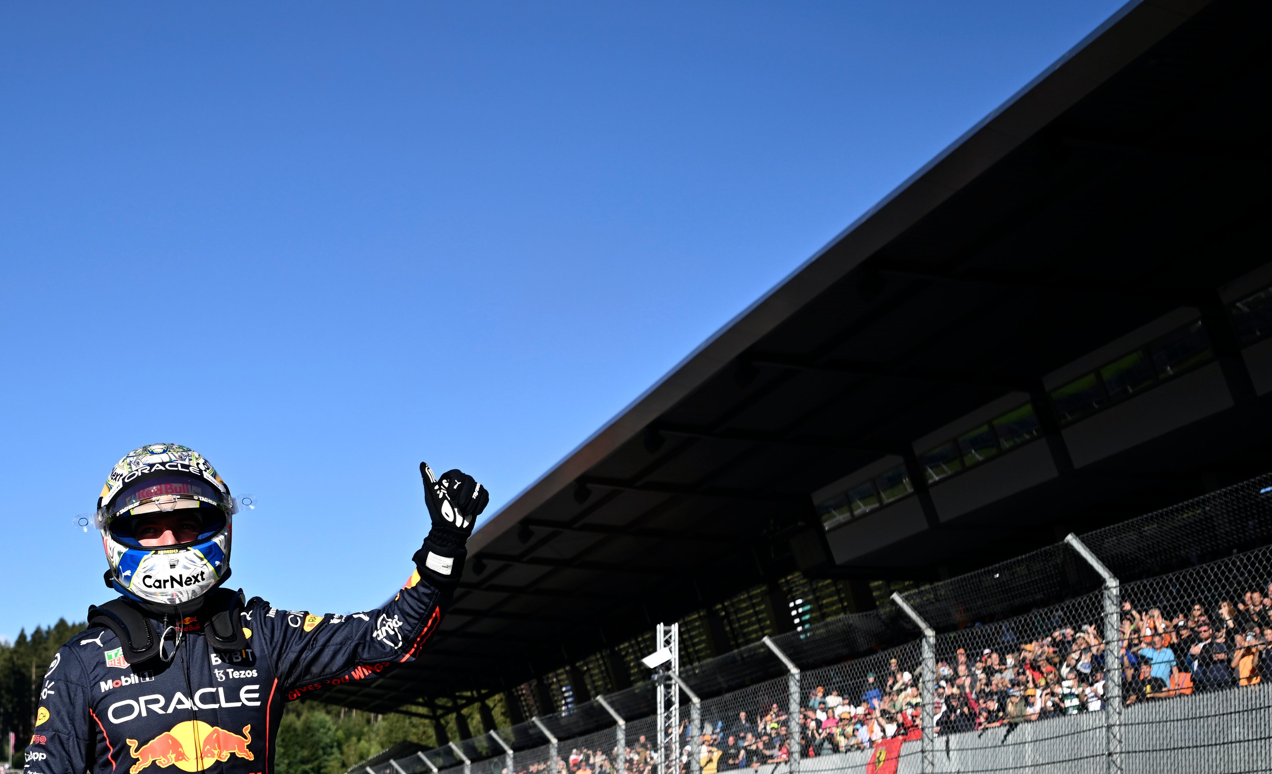 Red Bull driver Max Verstappen of the Netherlands celebrates after he clocked the fastest time during the qualifying session at the Red Bull Ring racetrack in Spielberg, Austria, Friday, July 8, 2022. The Austrian F1 Grand Prix will be held on Sunday July 10, 2022. (Christian Bruna/Pool via AP)