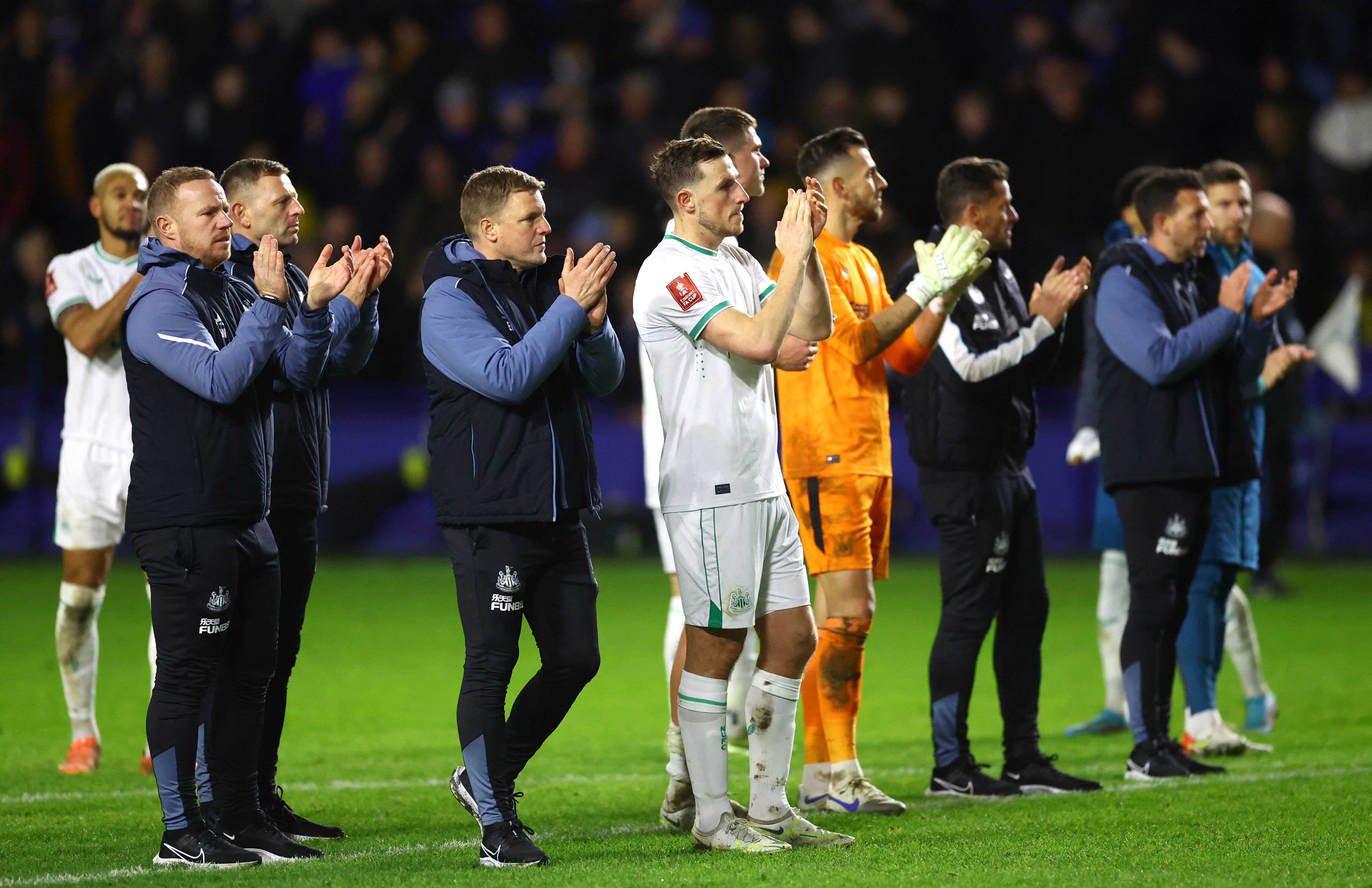 Soccer Football - FA Cup Third Round - Sheffield Wednesday v Newcastle United - Hillsborough Stadium, Sheffield, Britain - January 7, 2023 Newcastle United manager Eddie Howe and Chris Wood applaud their fans after the match REUTERS/Carl Recine