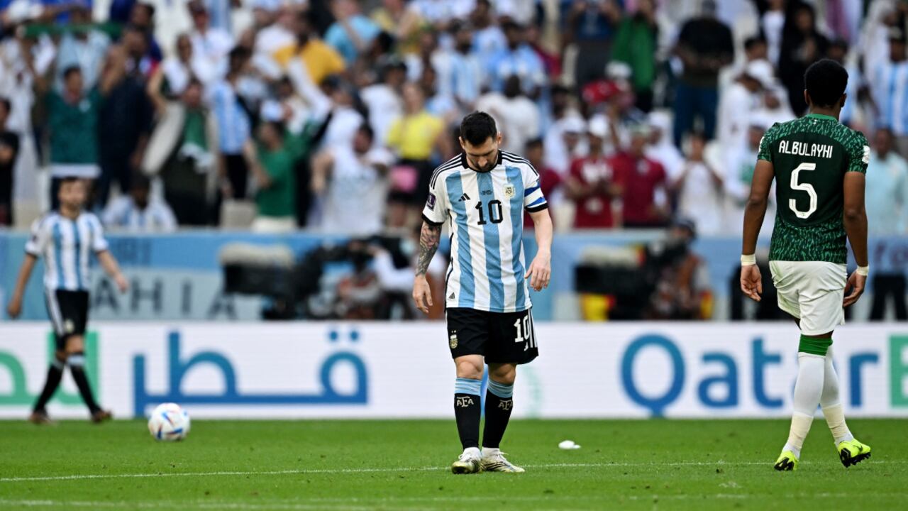 Soccer Football - FIFA World Cup Qatar 2022 - Group C - Argentina v Saudi Arabia - Lusail Stadium, Lusail, Qatar - November 22, 2022 Argentina's Lionel Messi looks dejected after Saudi Arabia's Saleh Al-Shehri scores their first goal REUTERS/Dylan Martinez