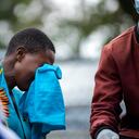 The relative of a victim of the Mpondwe Lhubiriha Secondary School mourns outside the Bwera General Hospital Mortuary, Kasese, on June 18, 2023. Distraught families gathered at a mortuary in western Uganda on Sunday for any news of their loved ones after a militant attack left dozens of students dead and others missing.
Officials say at least 41 people, mostly students, were massacred at a secondary school near the border of the Democratic Republic of Congo late Friday by militants linked to the Islamic State group. (Photo by Stuart Tibaweswa / AFP)