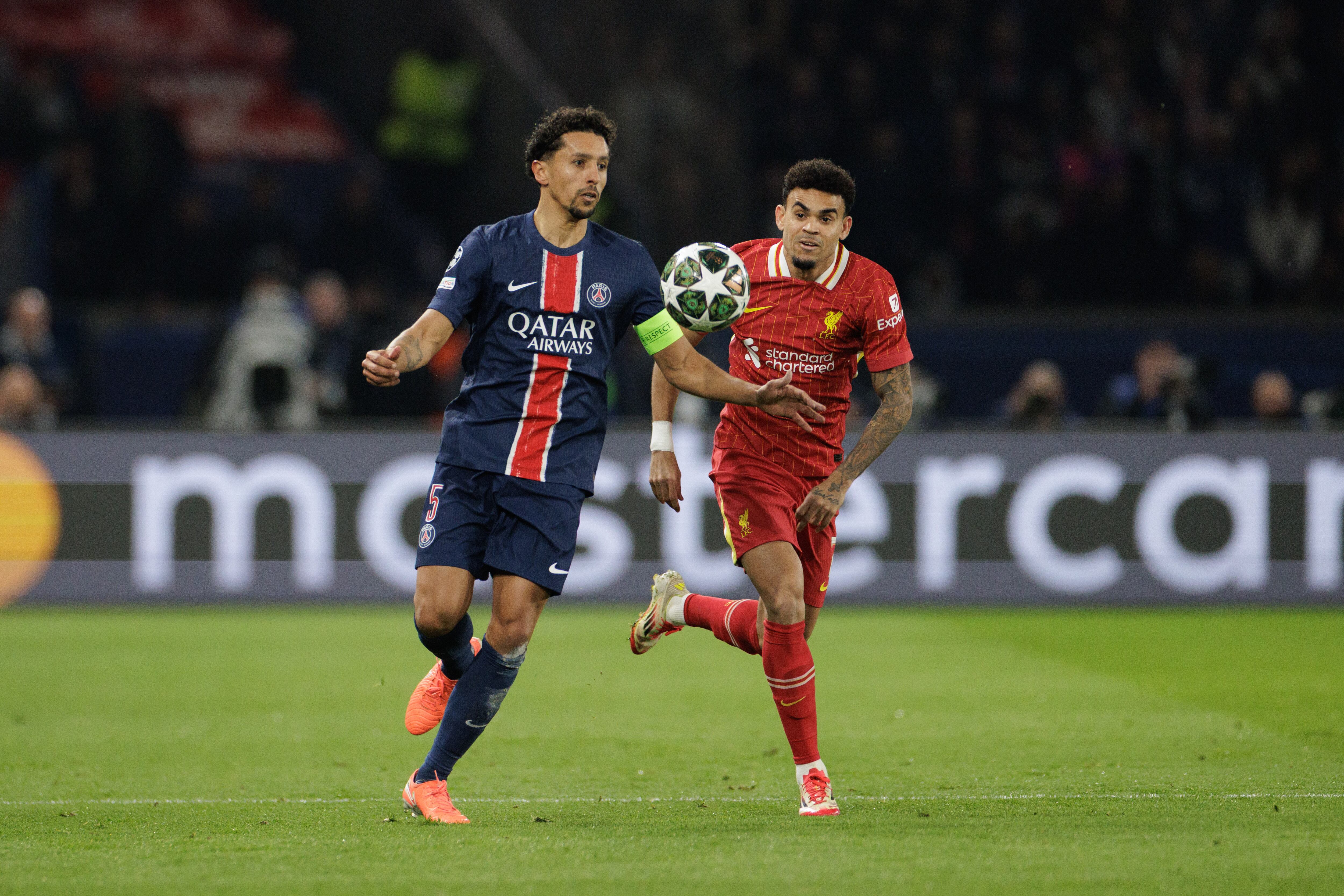 Paris, France - March 5: Marquinhos of Paris Saint-Germain and Luis Diaz of Liverpool FC in action during the UEFA Champions League 2024/25 Round of 16 First Leg match between Paris Saint-Germain and Liverpool FC at Parc des Princes on March 05, 2025 in Paris, France (Photo by Tnani Badreddine/DeFodi Images via Getty Images)