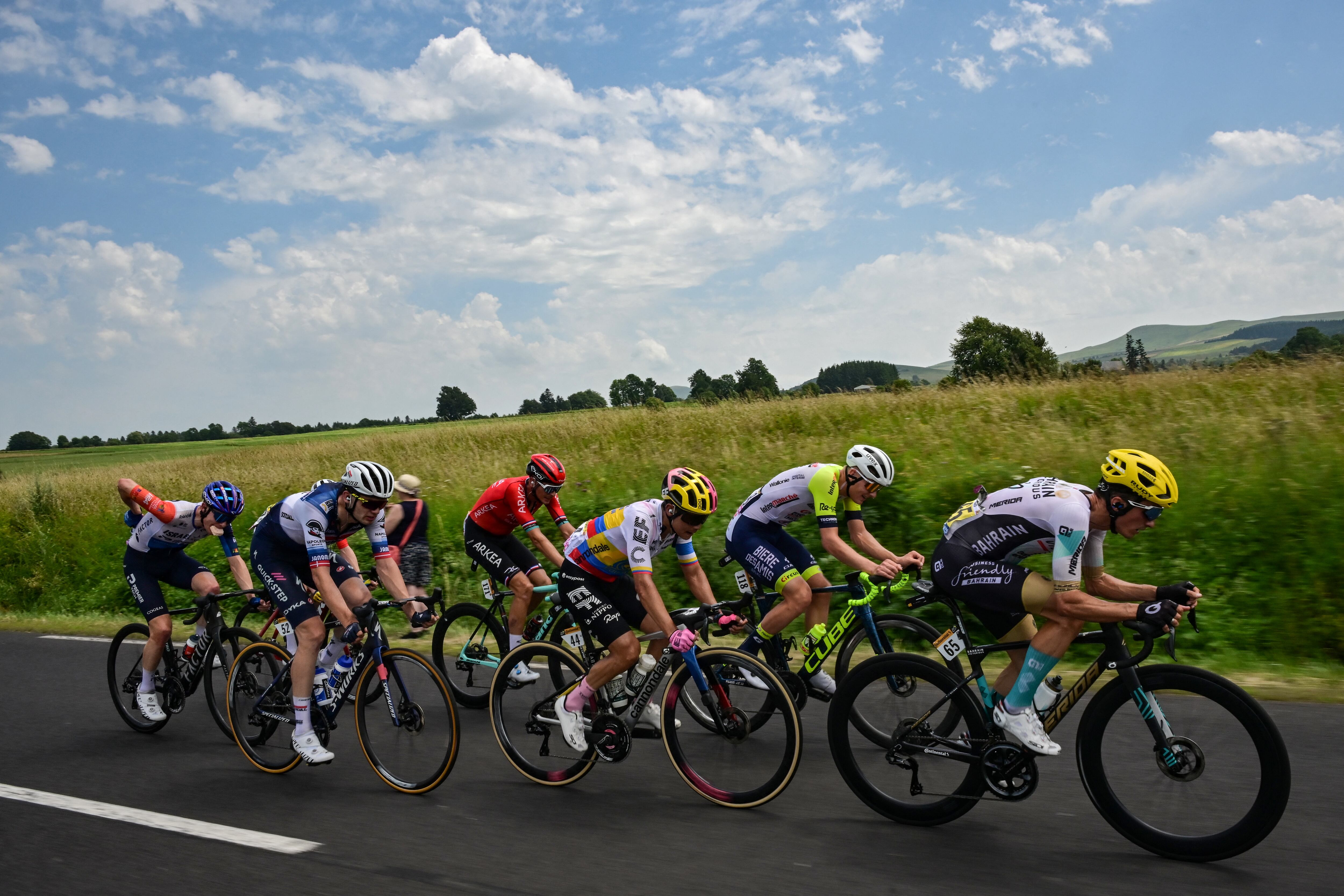 Bahrain - Victorious' Spanish rider Pello Bilbao (R), Intermarche - Circus - Wanty's German rider Georg Zimmermann (2nd R), EF Education - Easypost's Colombian rider Jhoan Esteban Chaves (C), Team Arkea - Samsic's French rider Warren Barguil (4th R) and Soudal Quick-Step's Danish rider Kasper Asgreen (2nd L) cycle in a breakaway during the 10th stage of the 110th edition of the Tour de France cycling race, 167,5 km between Vulcania and Issoire, in the Massif Central highlands in central France, on July 11, 2023. (Photo by Marco BERTORELLO / AFP)